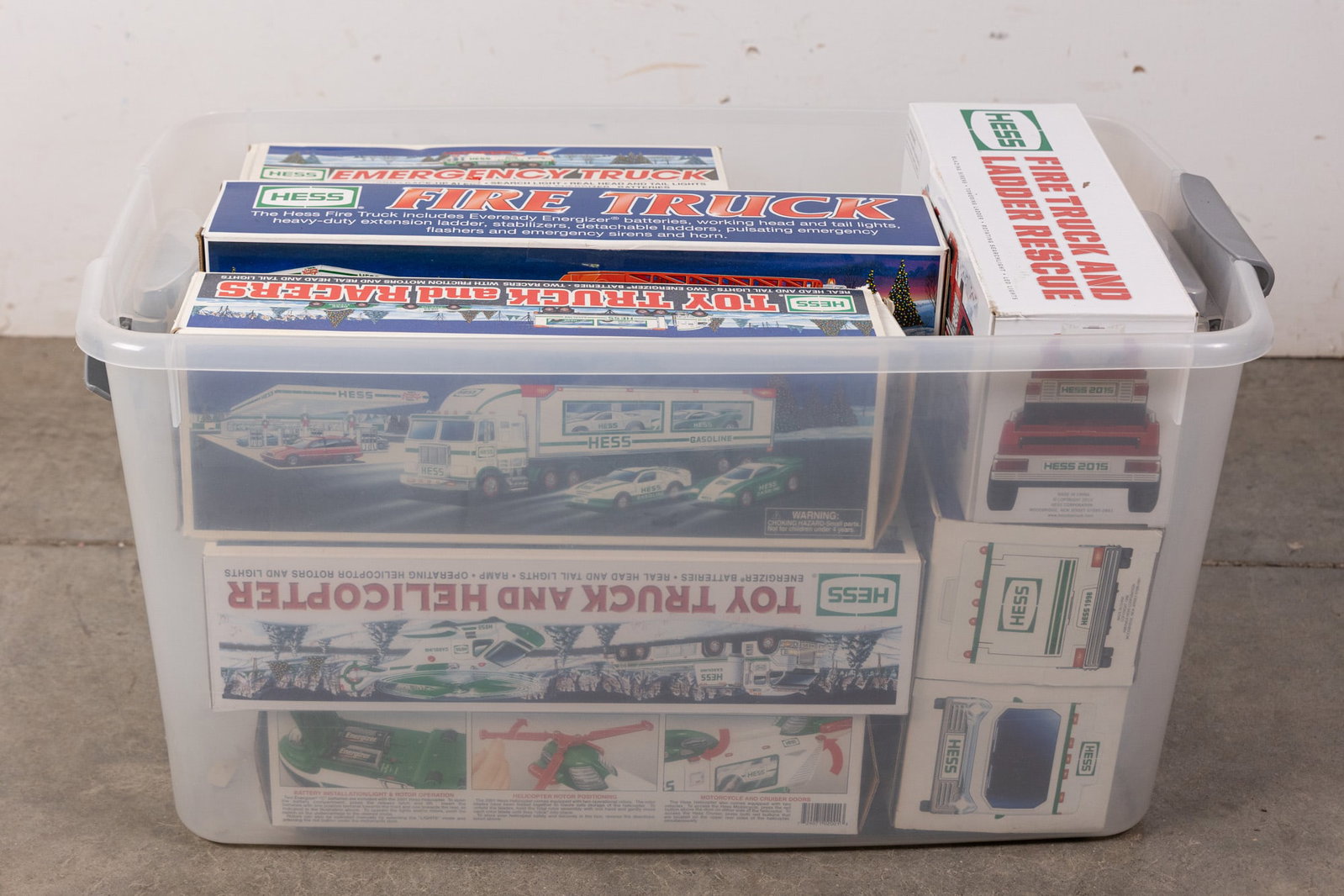 Assortment of Hess Trucks: Emergency Truck - Fire Truck and Ladder Rescue - Toy Truck and Racers - and more! Size 13" x 13" x 27" Literature Brooks Auction – Online Auction Terms & Conditions Contact: (856) 694-2960 |