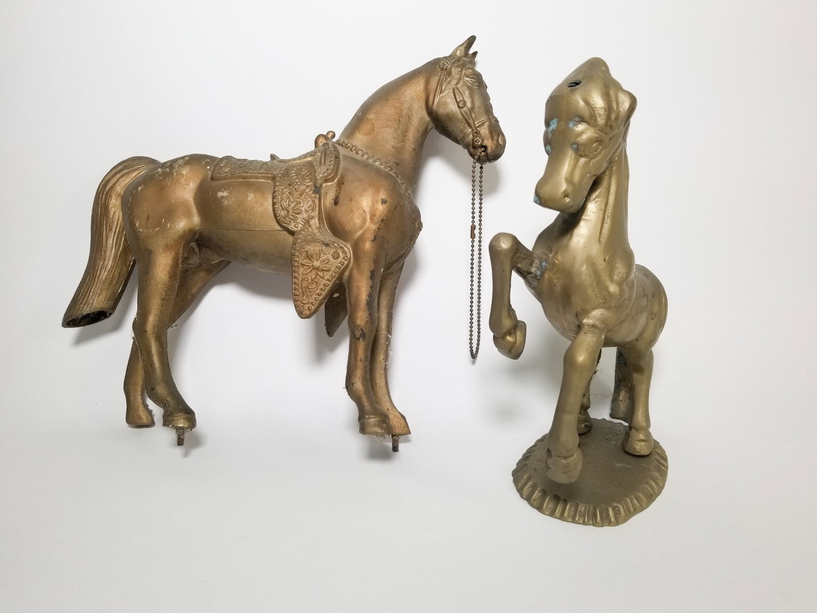 Two Brass Horse Sculptures: Two Brass Horse Sculptures Literature Brooks Auction – Online Auction Terms & Conditions Contact: (856) 694-2960 | info@brooks.auction READ BEFORE YOU BID: We want you to feel confident when bid