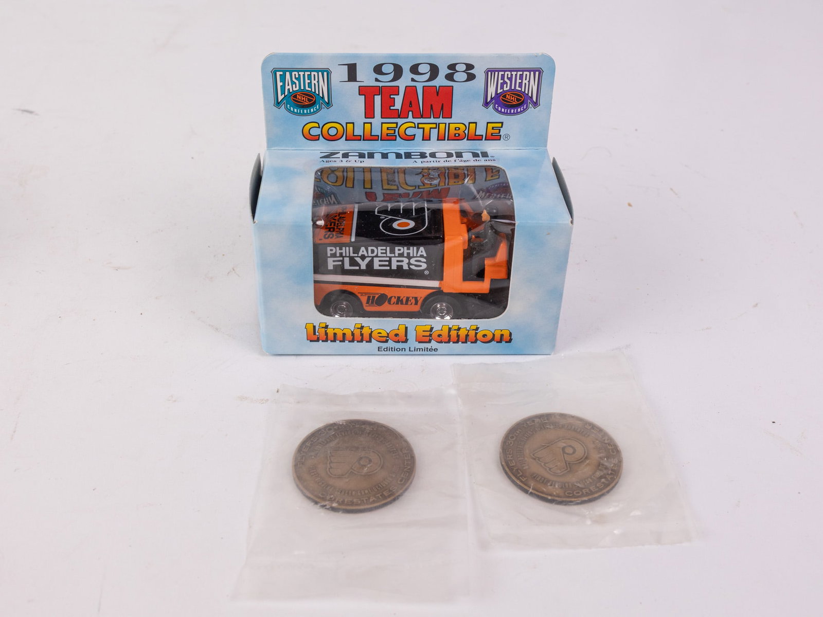 Assorted Philadelphia Flyers Collectibles: 1998 Team Collectible Zamboni - Two Flyers 30th year collectible coins Size 4" x 4" x 2" Literature Brooks Auction – Online Auction Terms & Conditions Contact: (856) 694-2960 |