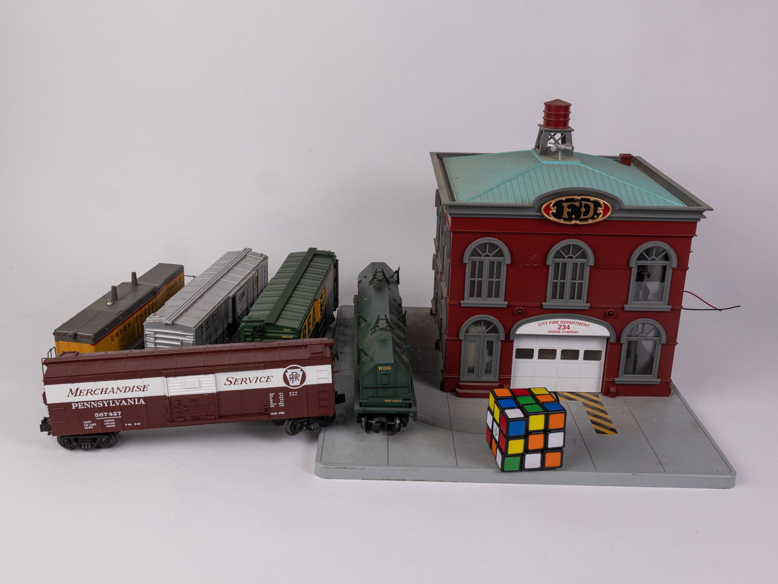 Assortment of Trains ft. MTH RailKing Operating Firehouse - 2