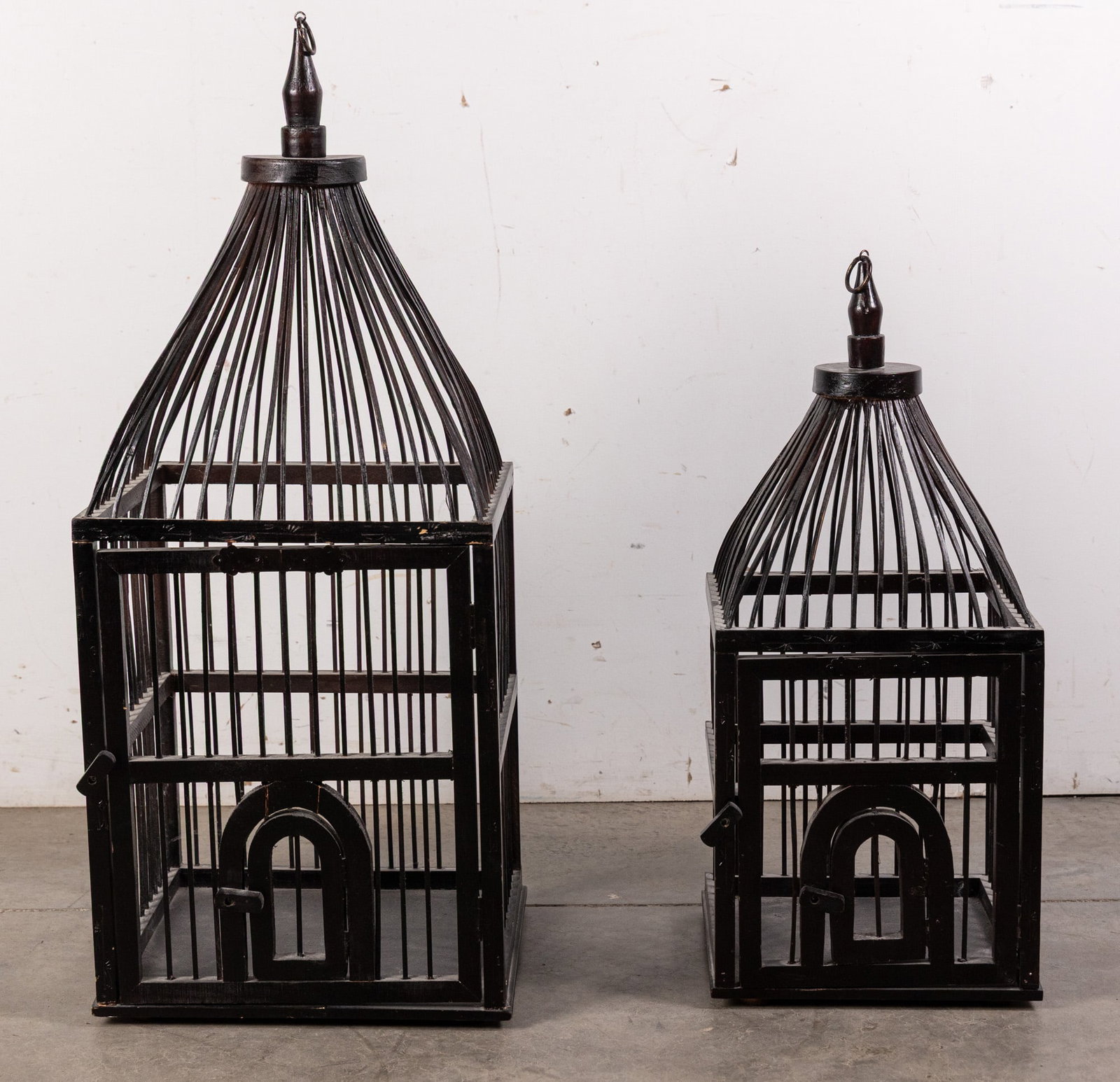 Pair of Decorative Hanging Birdcages: Pair of Decorative Hanging Birdcages Size 33" H Literature Brooks Auction – Online Auction Terms & Conditions Contact: (856) 694-2960 | info@brooks.auction READ BEFORE YOU BID: We want you to