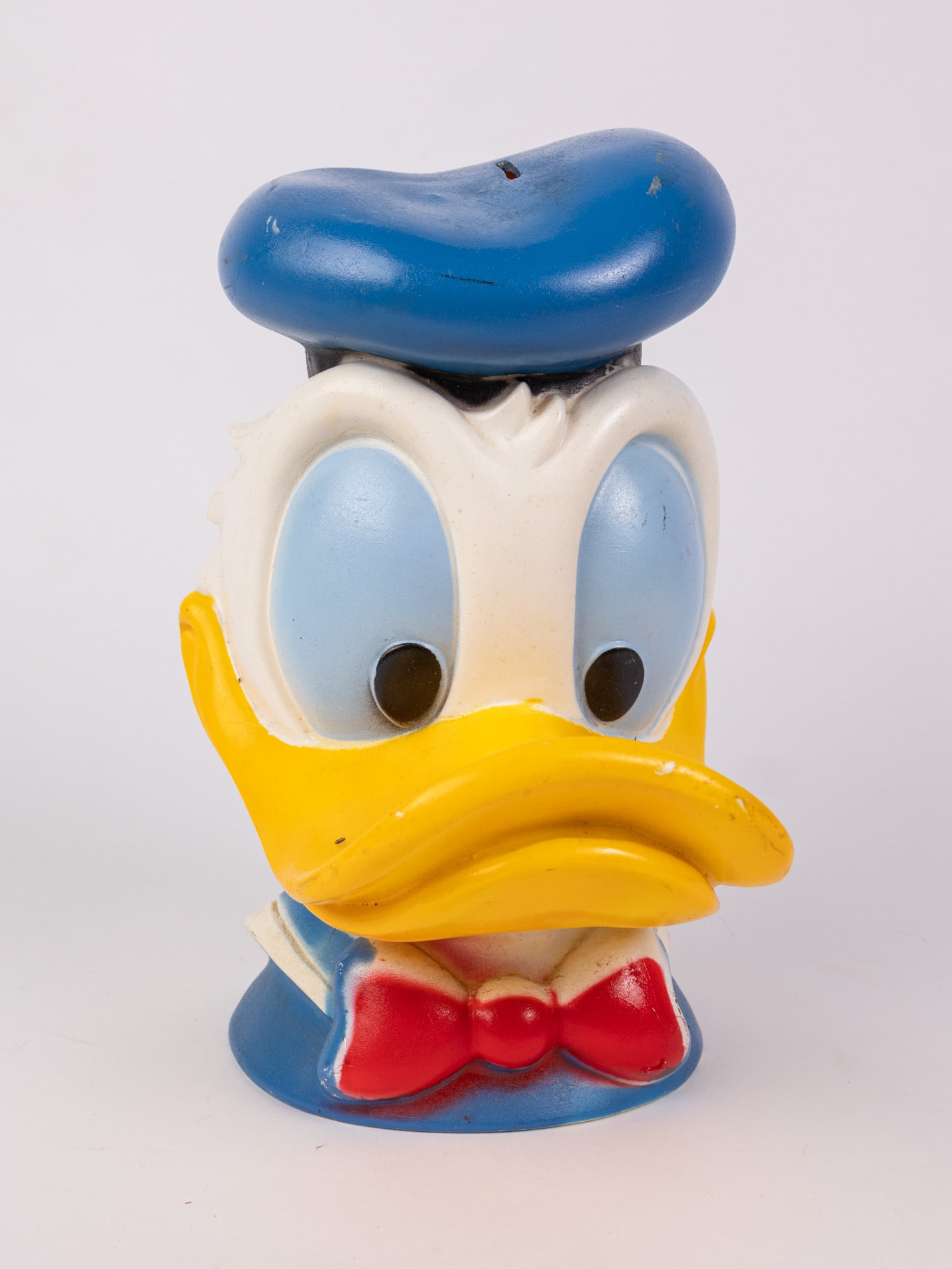1971 Walt Disney Donald Duck Coin Bank: 1971 Walt Disney Donald Duck Coin Bank Size 10.5" H Literature Brooks Auction – Online Auction Terms & Conditions Contact: (856) 694-2960 | info@brooks.auction READ BEFORE YOU BID: We want you