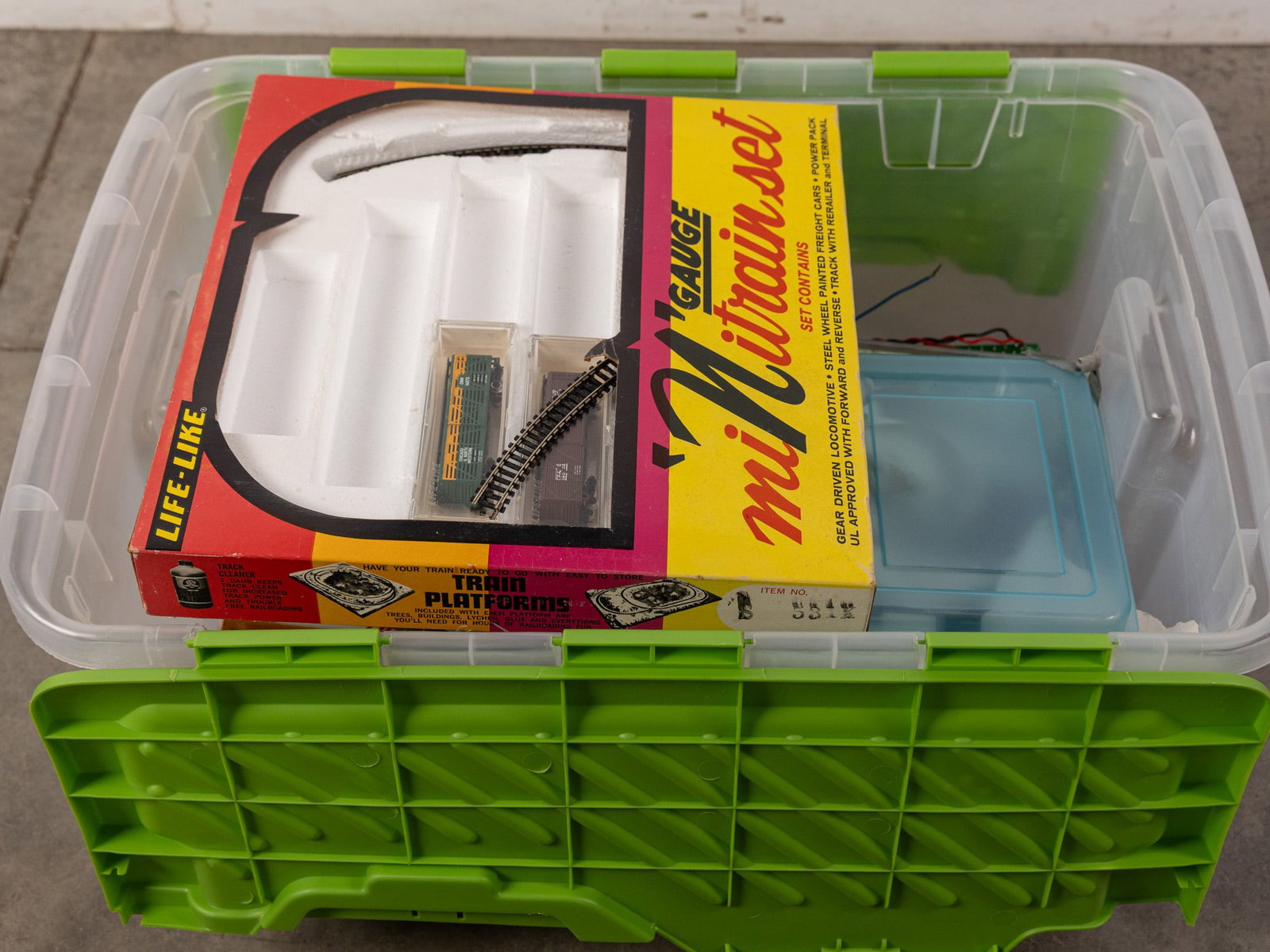 Assortment of Trains and Accessories: Life Like N Gauge - Atlas - Arnold Rapido- and more! Size 11" x 14" x 23" Literature Brooks Auction – Online Auction Terms & Conditions Contact: (856) 694-2960 | info@brooks.auction READ BEFORE