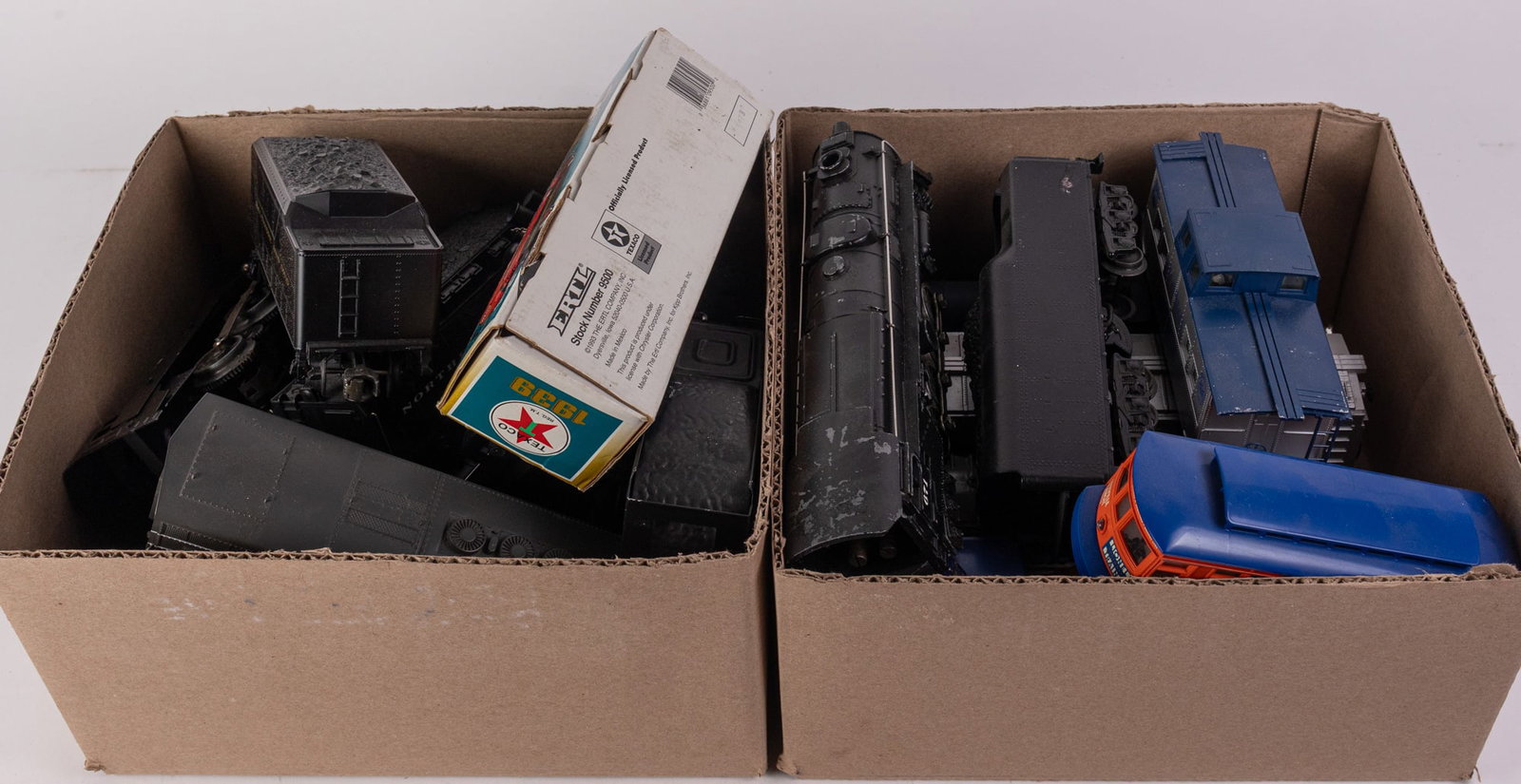 Assortment of Trains: Lionel 18609 Northern Pacific - Vintage Marx O Gauge Train - Williams NW-2 Seaboard Switcher - and more! Size 7" x 12" x 12" Literature Brooks Auction – Online Auction Terms & Conditions Contact