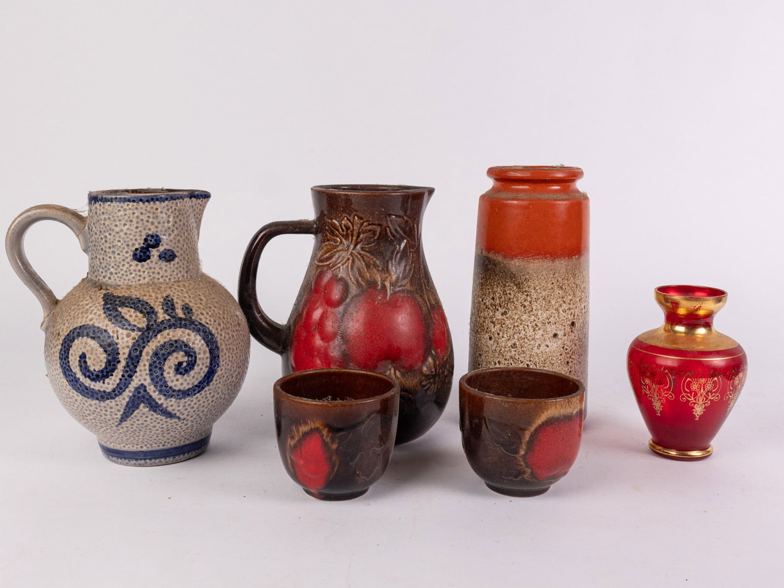 Assorted Mid Century Decorative Vessels: Assorted Mid Century Decorative Vessels Size 7" x 12" x 12" Literature Brooks Auction – Online Auction Terms & Conditions Contact: (856) 694-2960 | info@brooks.auction READ BEFORE YOU BID: We