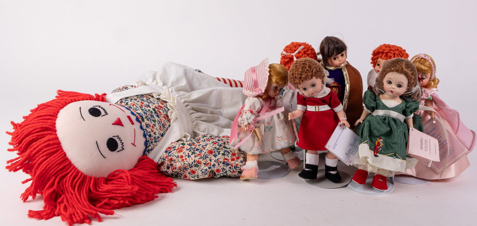 Lot of Assorted Dolls Featuring Madame Alexander: Lot of Assorted Dolls Featuring Madame Alexander Size 7" x 12" x 12" Literature Brooks Auction – Online Auction Terms & Conditions Contact: (856) 694-2960 | info@brooks.auction READ BEFORE YOU