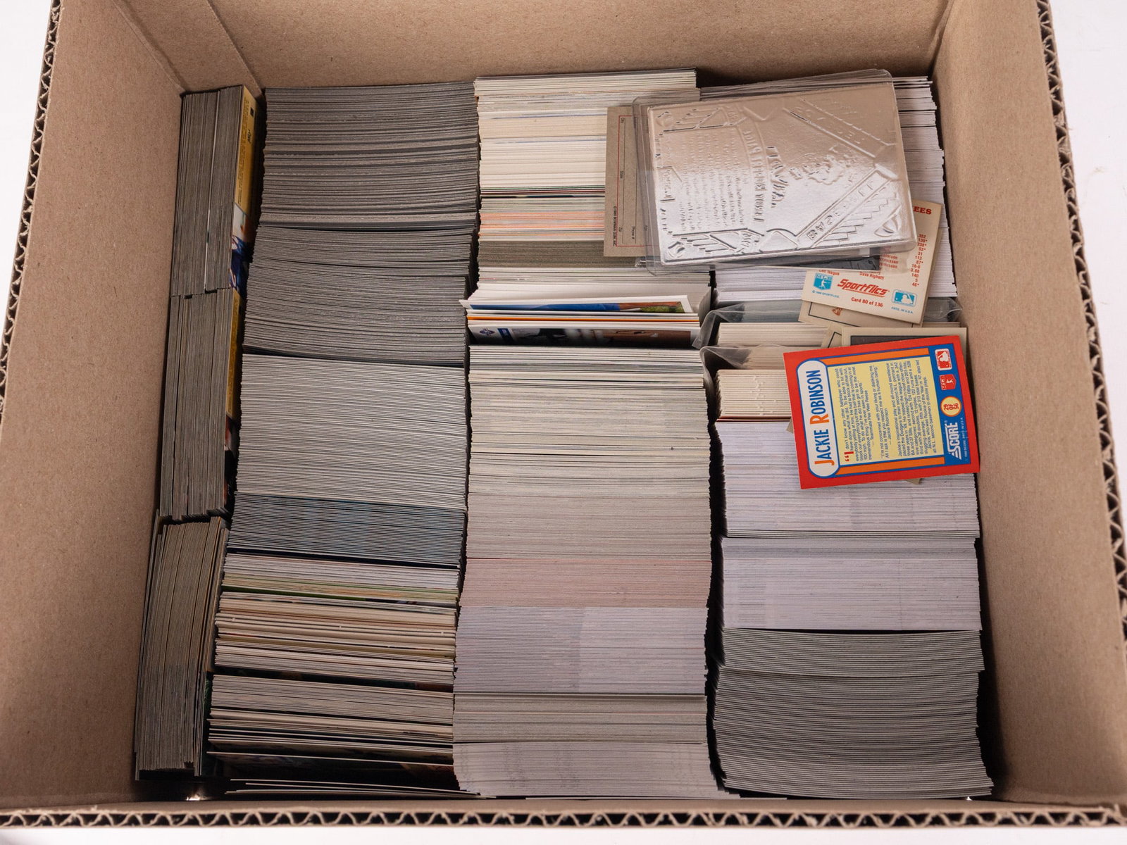 Large Assortment of Sports Trading Cards: Large Assortment of Sports Trading Cards Size 7" x 12" x 12" Literature Brooks Auction – Online Auction Terms & Conditions Contact: (856) 694-2960 | info@brooks.auction READ BEFORE YOU BID: We