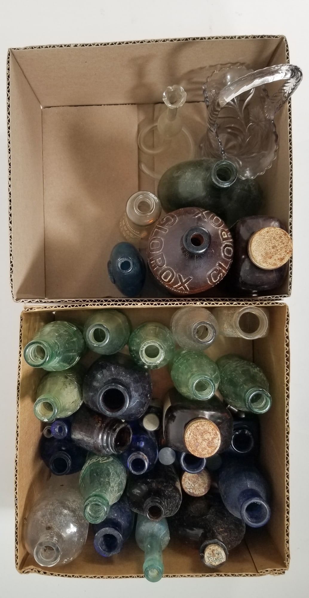Assorted Vintage and Antique Bottles: Assorted Vintage and Antique Bottles Size 7" x 12" x 12" Literature Brooks Auction – Online Auction Terms & Conditions Contact: (856) 694-2960 | info@brooks.auction READ BEFORE YOU BID: We want