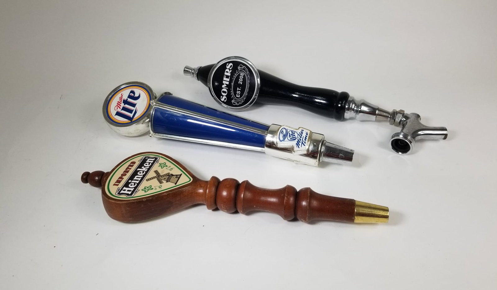 Three Beer Taps: Three Beer Taps Size 7" x 12" x 12" Literature Brooks Auction – Online Auction Terms & Conditions Contact: (856) 694-2960 | info@brooks.auction READ BEFORE YOU BID: We want you to feel c