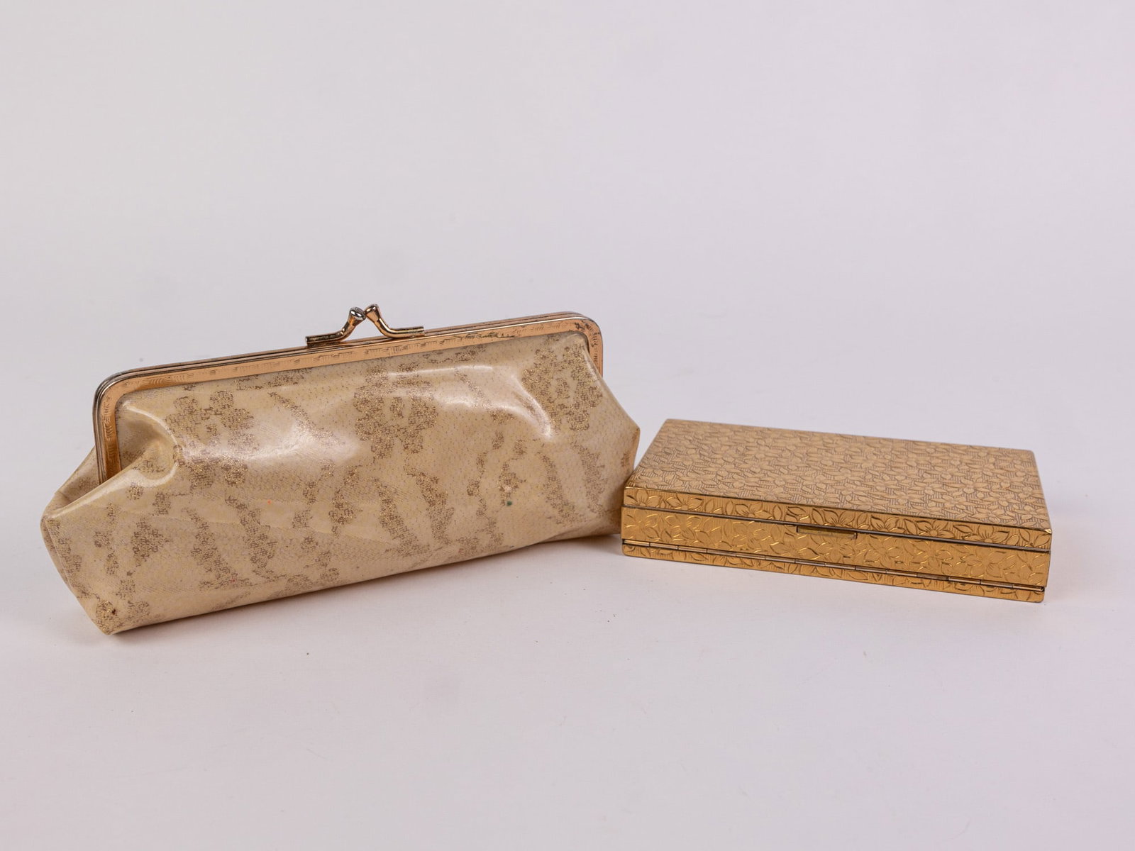Vintage Evans Gold Carryall Compact Set w/ Cigarette Holder and Clutch: Vintage Evans Gold Carryall Compact Set w/ Cigarette Holder and Clutch Literature Brooks Auction – Online Auction Terms & Conditions Contact: (856) 694-2960 | info@brooks.auction READ BEFORE