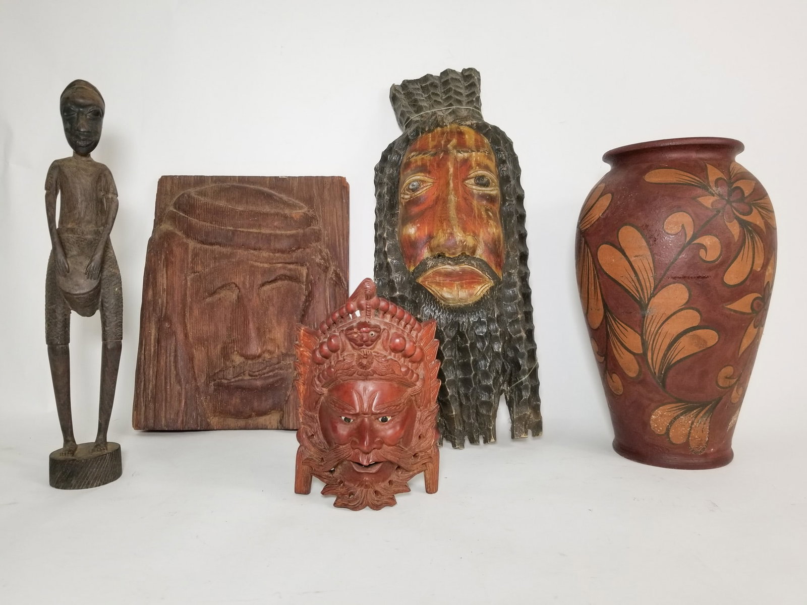 Assorted Carved Wooden Figures and Masks: Assorted Carved Wooden Figures and Masks Size 13" H Literature Brooks Auction – Online Auction Terms & Conditions Contact: (856) 694-2960 | info@brooks.auction READ BEFORE YOU BID: We want you
