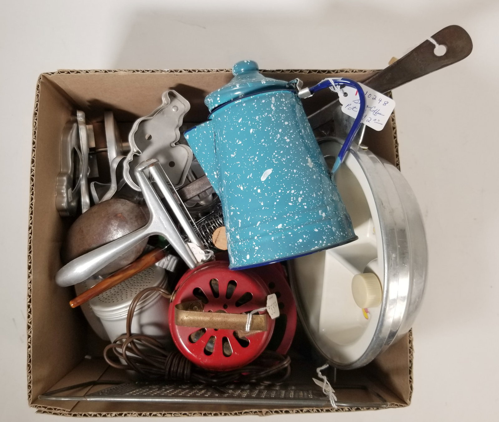 Assortment of Primitive Cookware: Assortment of Primitive Cookware Size 7" x 12" x 12" Literature Brooks Auction – Online Auction Terms & Conditions Contact: (856) 694-2960 | info@brooks.auction READ BEFORE YOU BID: We want you