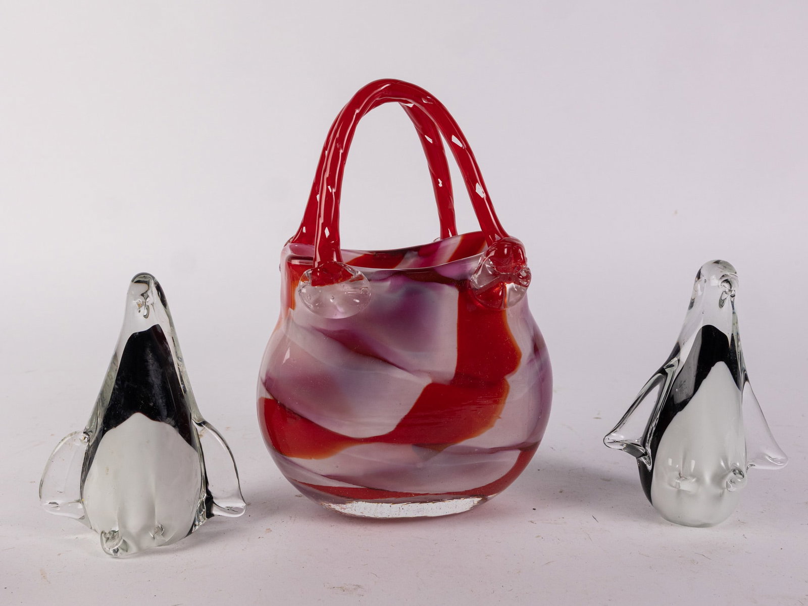 Three Pieces of Art Glass: Three (3) Pieces of Art Glass Size 9" H Literature Brooks Auction – Online Auction Terms & Conditions Contact: (856) 694-2960 | info@brooks.auction READ BEFORE YOU BID: We want you to feel