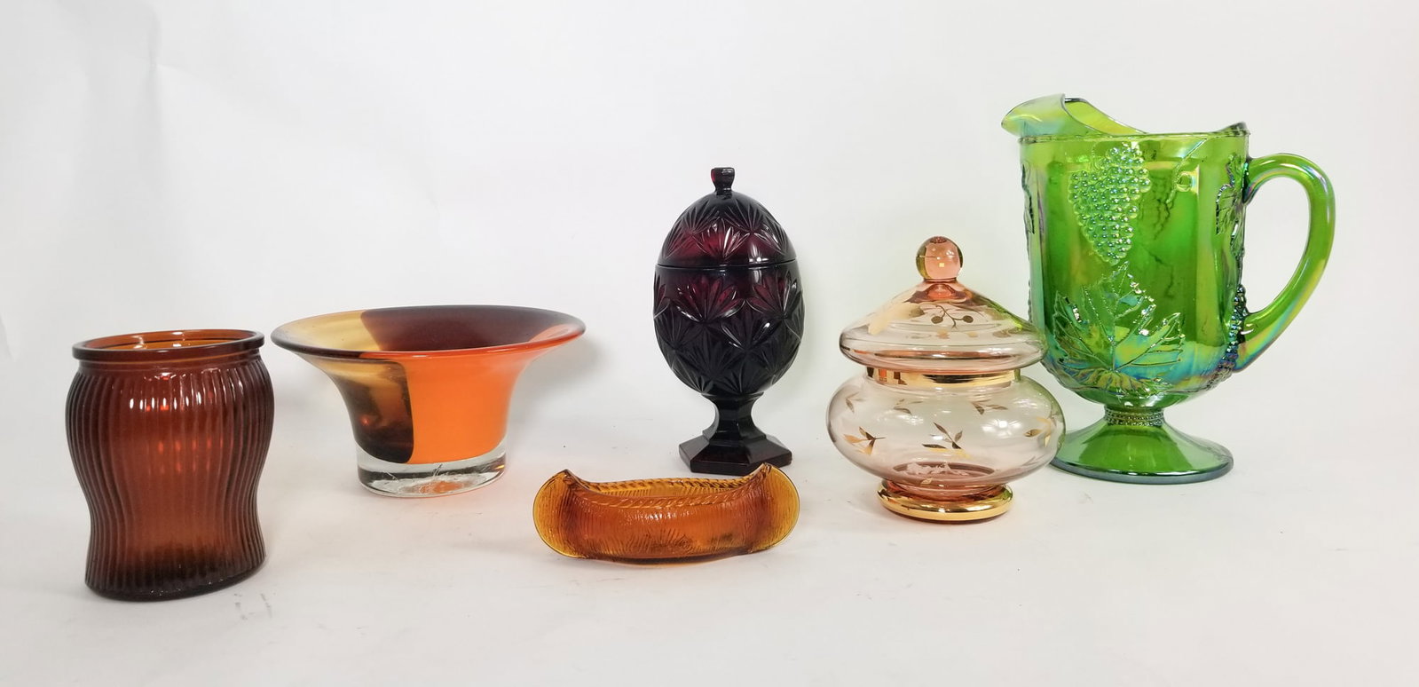Assortment of Glassware ft. Indiana Glass Green Carnival Glass Harvest Grape Pitcher (1 of 5)