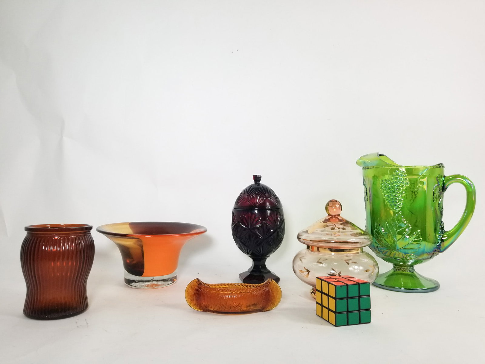 Assortment of Glassware ft. Indiana Glass Green Carnival Glass Harvest Grape Pitcher - 2