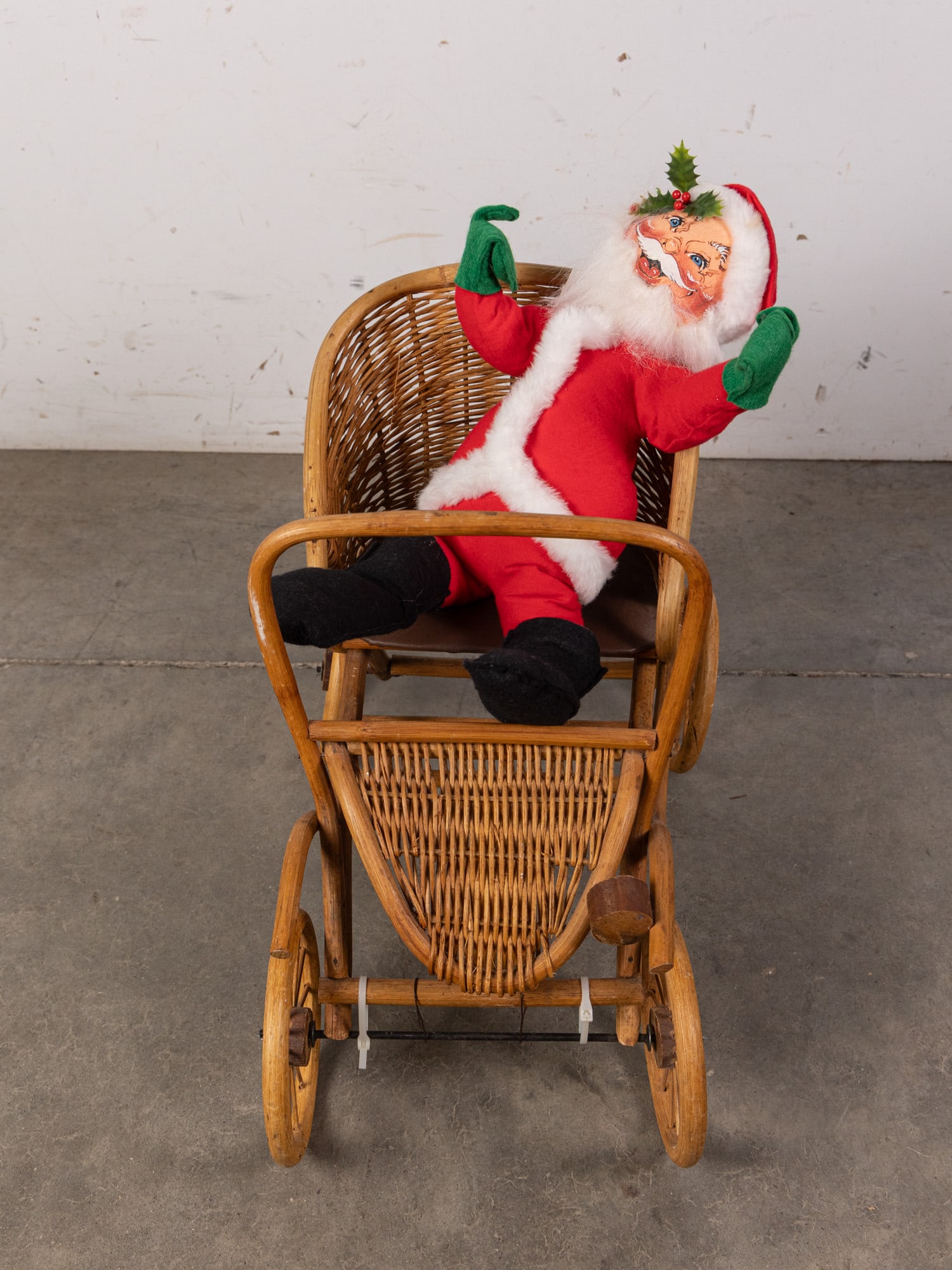 Vintage Annalee Santa Doll with Wicker Buggy: Buggy is not Annalee branded. Size 16" x 23" x 11" Literature Brooks Auction – Online Auction Terms & Conditions Contact: (856) 694-2960 | info@brooks.auction READ BEFORE YOU BID: We wan