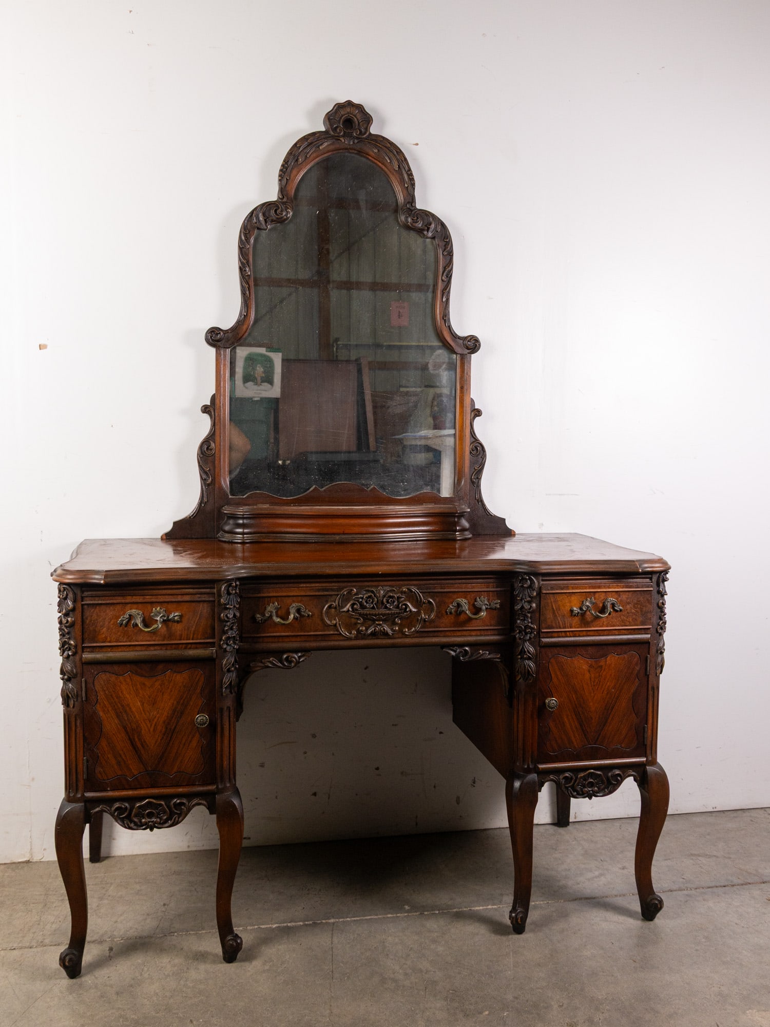 Antique Intricately Carved Desk/Vanity with Mirror: Antique Intricately Carved Desk/Vanity with Mirror Size 30" x 47" x 20" Literature Brooks Auction – Online Auction Terms & Conditions Contact: (856) 694-2960 | info@brooks.auction READ BEFORE