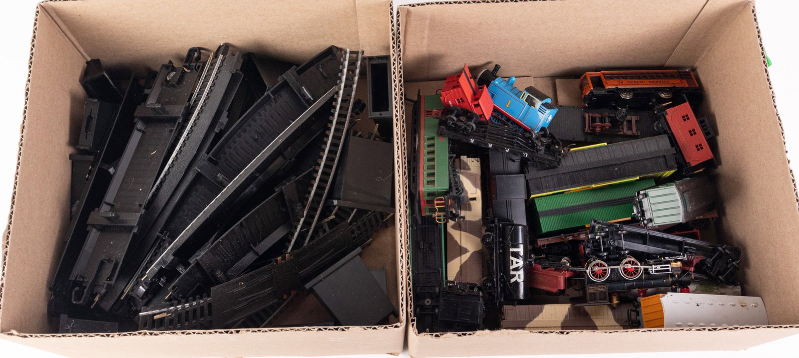 Lot of Vintage Model Railroad Train Cars and Track: Lot of Vintage Model Railroad Train Cars and Track Size 7" x 12" x 12" Literature Brooks Auction – Online Auction Terms & Conditions Contact: (856) 694-2960 | info@brooks.auction READ BEFORE