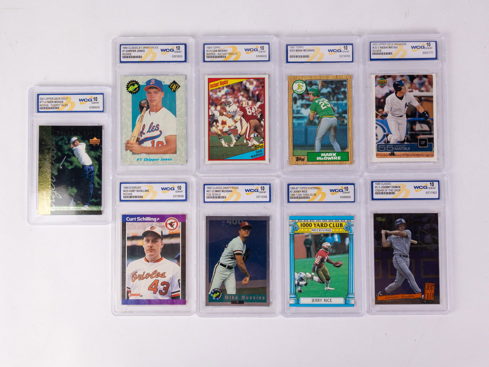 Assorted WCG Graded Collectible Sports Cards: Assorted WCG Graded Collectible Sports Cards Size 7" x 12" x 12" Literature Brooks Auction – Online Auction Terms & Conditions Contact: (856) 694-2960 | info@brooks.auction READ BEFORE YOU B