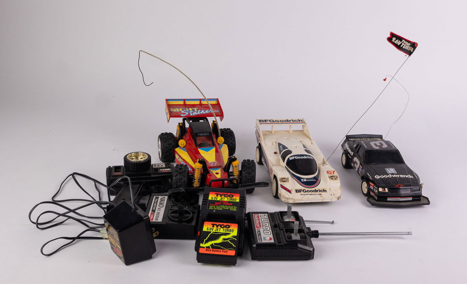 Assortment of RC Vehicles and Remotes: Assortment of RC Vehicles and Remotes Size 7" x 12" x 12" Literature Brooks Auction – Online Auction Terms & Conditions Contact: (856) 694-2960 | info@brooks.auction READ BEFORE YOU BID: We