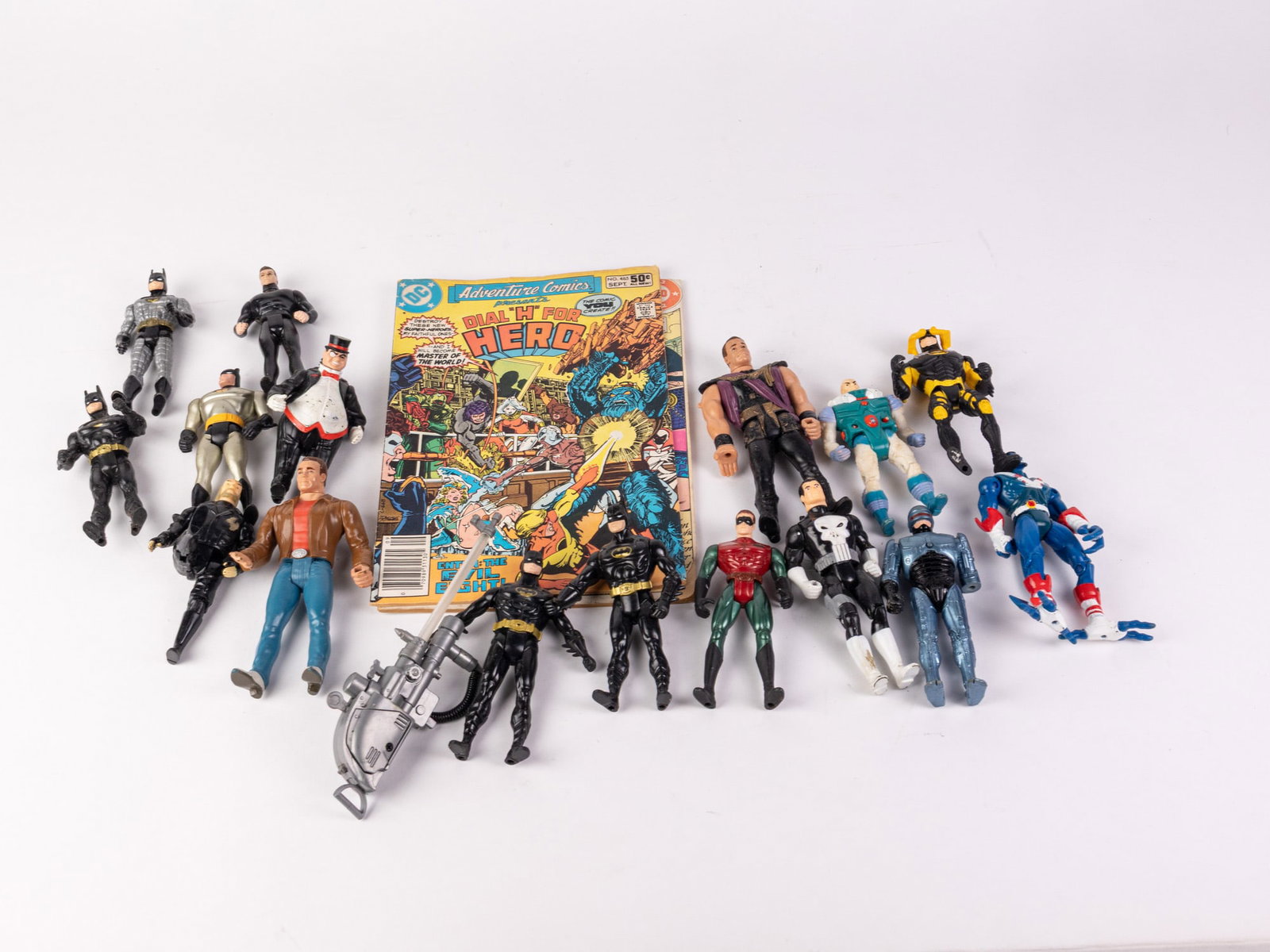 Assorted Vintage Superhero Action Figures Featuring Batman: Assorted Vintage Superhero Action Figures Featuring Batman Size 7" x 12" x 12" Literature Brooks Auction – Online Auction Terms & Conditions Contact: (856) 694-2960 | info@brooks.auction REA