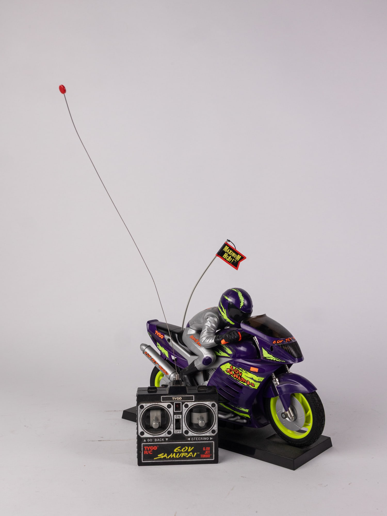 Tyco 6.0V Samurai RC Toy Motorcycle with Remote: Untested. Size 7" x 12" x 12" Literature Brooks Auction – Online Auction Terms & Conditions Contact: (856) 694-2960 | info@brooks.auction READ BEFORE YOU BID: We want you to feel confident when