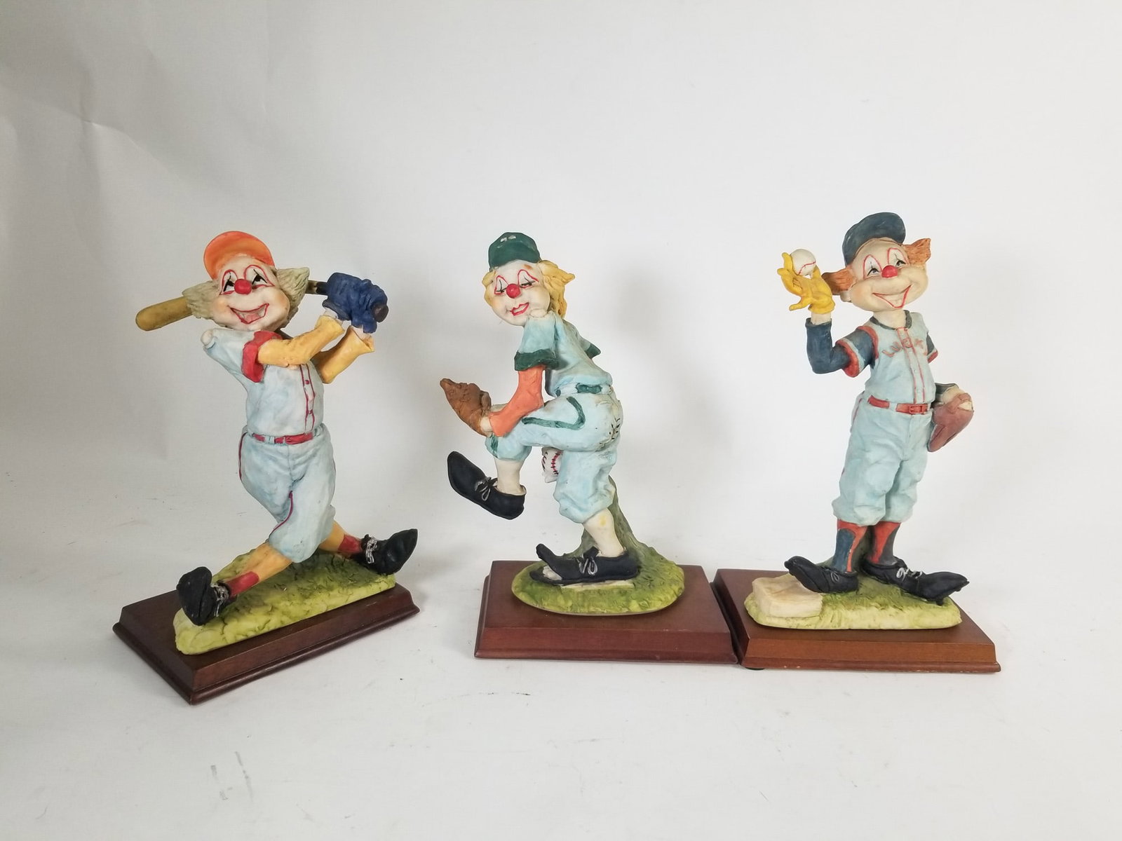 Three Davar Originals Baseball Clown Figurines: Three (3) Davar Originals Baseball Clown Figurines Size 12" H Literature Brooks Auction – Online Auction Terms & Conditions Contact: (856) 694-2960 | info@brooks.auction READ BEFORE YOU BID: We
