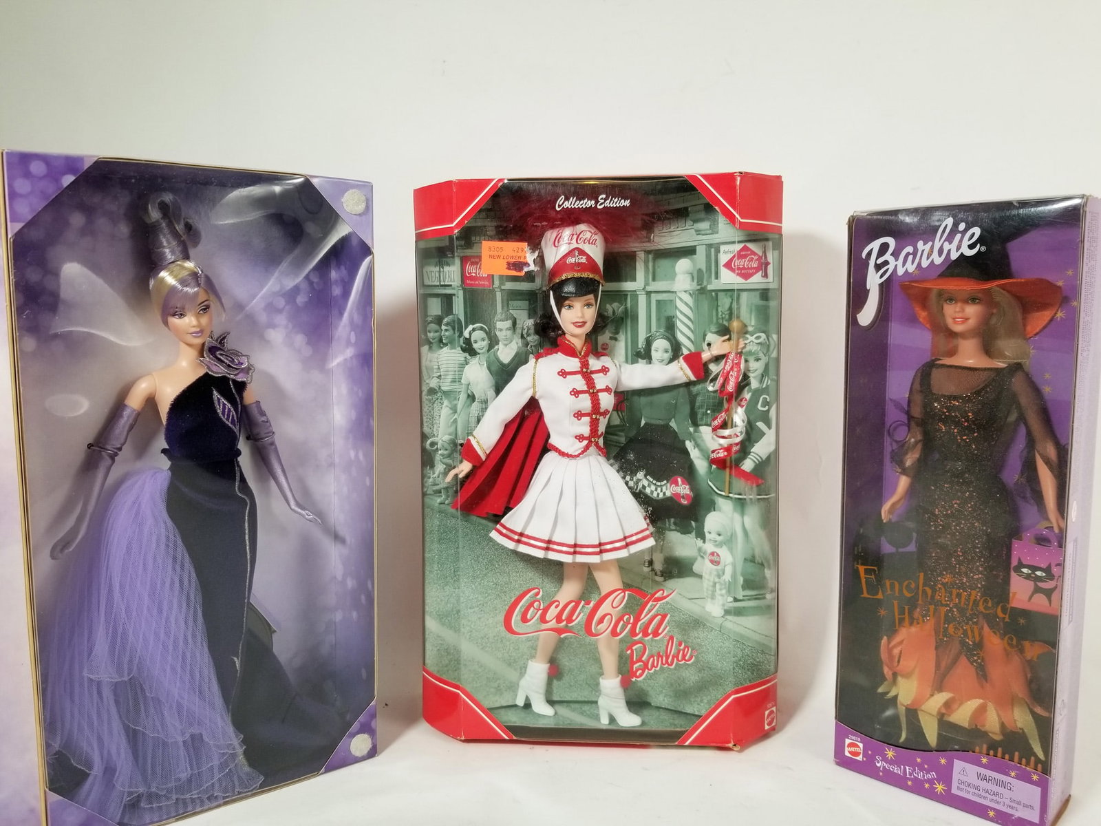 Three Vintage Barbie Dolls IOB: Enchanted Halloween - The Sterling Silver Rose Bob Mackie - Coca Cola Barbie Size 13" x 9" x 3" Literature Brooks Auction – Online Auction Terms & Conditions Contact: (856) 694-2960 | info@broo
