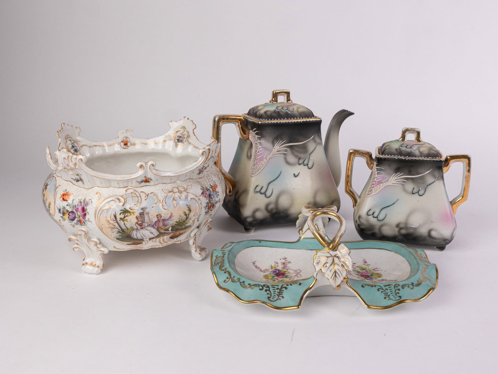 Vintage and Antique Porcelain Servingware: Vintage and Antique Porcelain Servingware Size 7" x 12" x 12" Literature Brooks Auction – Online Auction Terms & Conditions Contact: (856) 694-2960 | info@brooks.auction READ BEFORE YOU BID: We