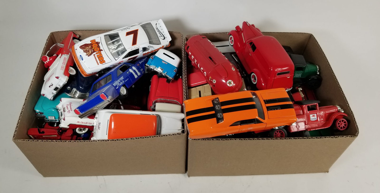 Assortment of Vintage Diecast Automobiles ft. Hooters Thunderbird: Assortment of Vintage Diecast Automobiles ft. Hooters Thunderbird Size 7" x 12" x 12" Literature Brooks Auction – Online Auction Terms & Conditions Contact: (856) 694-2960 | info@brooks.auction