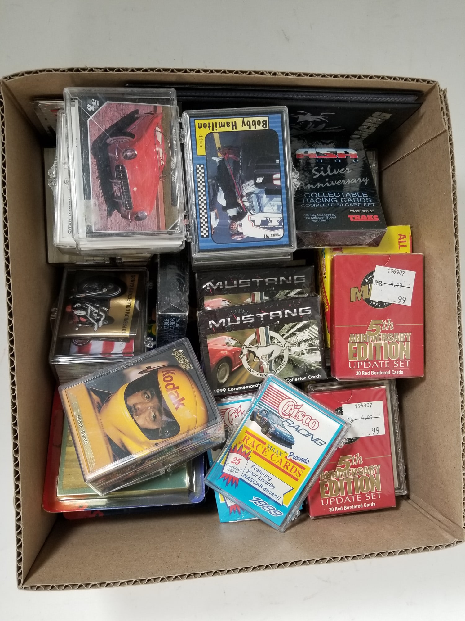 Assortment of Racing Trading Cards: Assortment of Racing Trading Cards Size 7' x 12" x 12" Literature Brooks Auction – Online Auction Terms & Conditions Contact: (856) 694-2960 | info@brooks.auction READ BEFORE YOU BID: We want