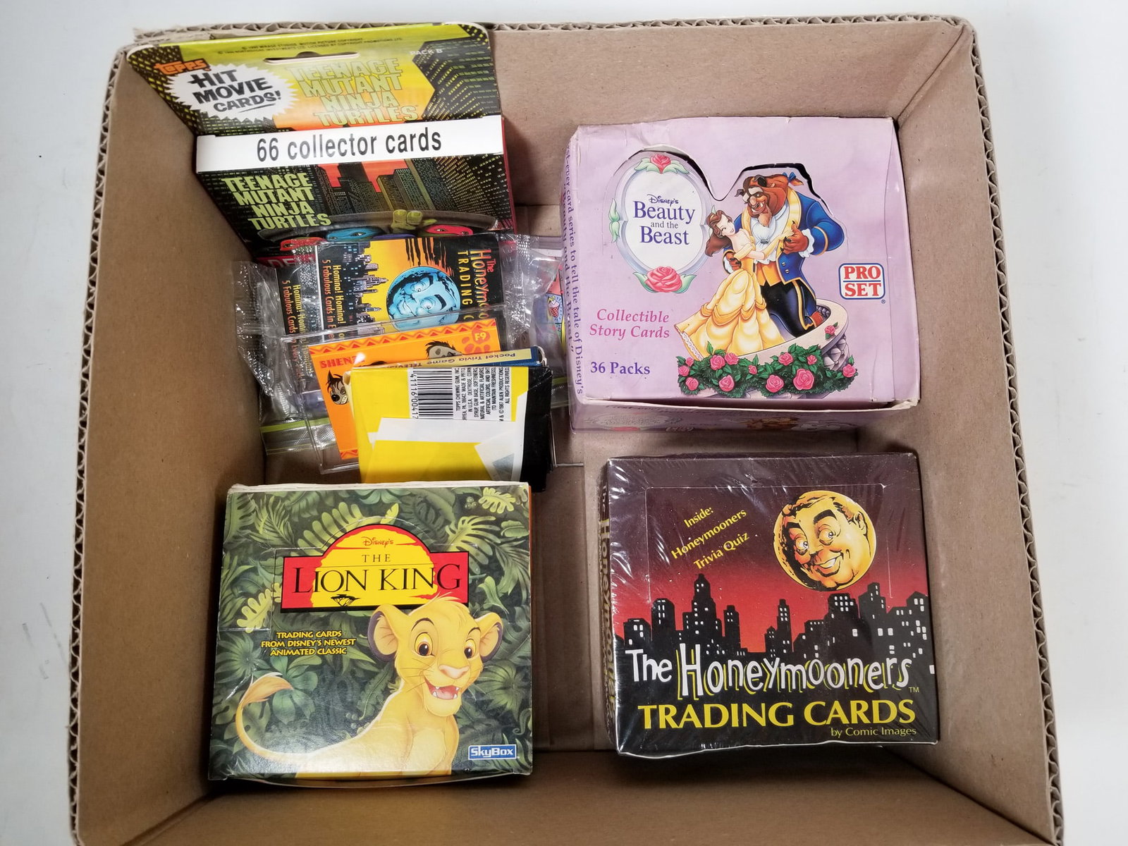 Assortment of Pop Culture Trading Cards: Assortment of Pop Culture Trading Cards Size 7" x 12" x 12" Literature Brooks Auction – Online Auction Terms & Conditions Contact: (856) 694-2960 | info@brooks.auction READ BEFORE YOU BID: We