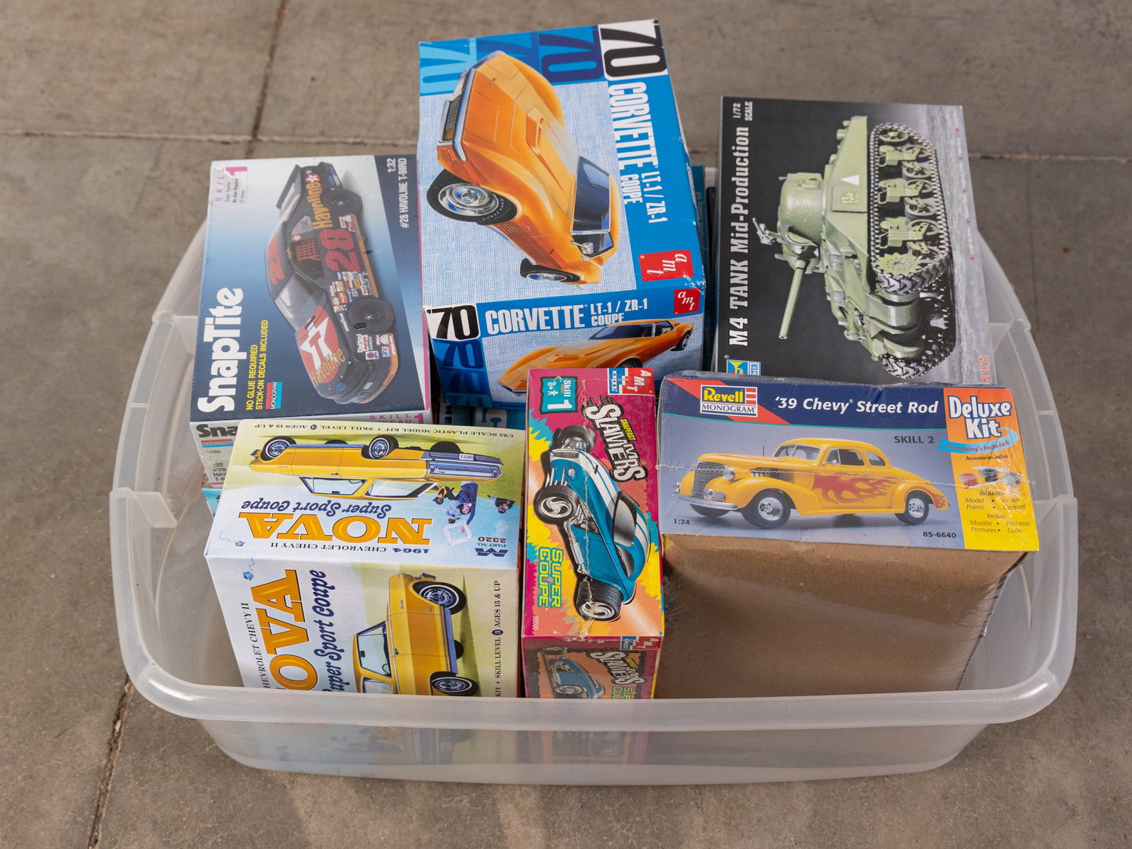 Large Assortment of Vintage Automobile Model Kits: Large Assortment of Vintage Automobile Model Kits Size 6" x 25" x 19" Literature Brooks Auction – Online Auction Terms & Conditions Contact: (856) 694-2960 | info@brooks.auction READ BEFORE