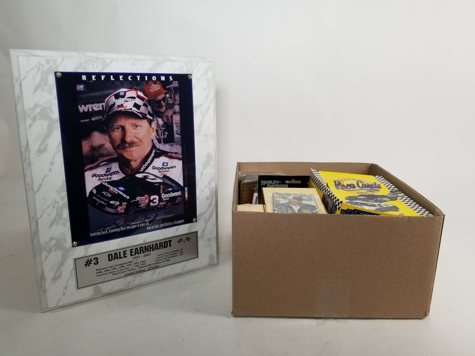 Assortment of Vintage Racing Memorabilia ft. Dale Earnhardt "Reflections" Commemorative Plaque: Assortment of Vintage Racing Memorabilia ft. Dale Earnhardt "Reflections" Commemorative Plaque Size 15" x 12" x 1" Literature Brooks Auction – Online Auction Terms & Conditions Contact: (856)