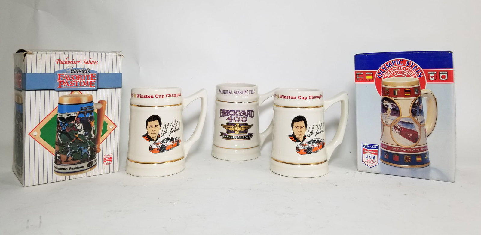 Assortment of Novelty Sports Mugs: Assortment of Novelty Sports Mugs Size 7" x 12" x 12" Literature Brooks Auction – Online Auction Terms & Conditions Contact: (856) 694-2960 | info@brooks.auction READ BEFORE YOU BID: We want
