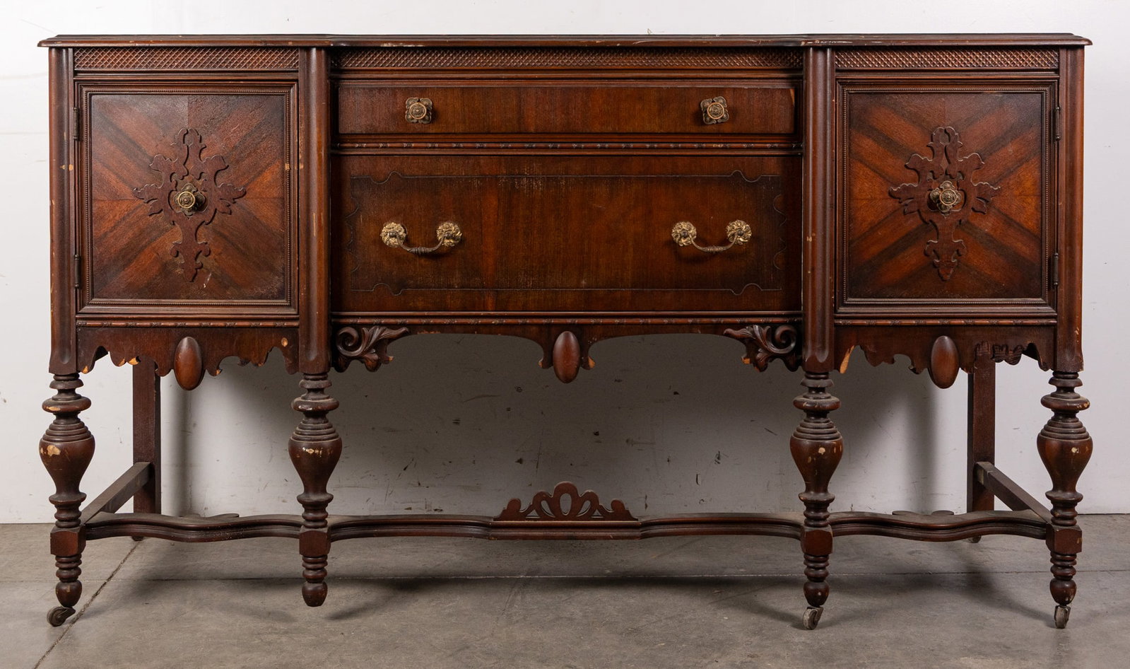 Wooden Ornate Jacobean-Style Buffet: Wooden Ornate Jacobean-Style Buffet Size 35" x 67" x 21" Literature Brooks Auction – Online Auction Terms & Conditions Contact: (856) 694-2960 | info@brooks.auction READ BEFORE YOU BID: We want