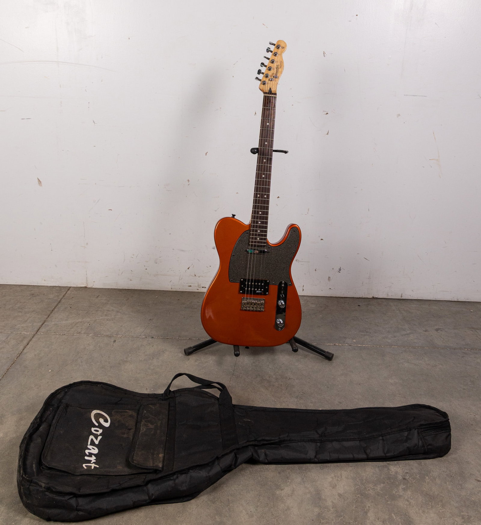 Custom Built Fender Telecaster Type Electric Guitar: Telecaster shaped body in fiery electric orange. Seems to be a custom job constructed from various vintage parts. Serial number on headstock reads N304768. Size 38" H Literature Brooks Auction –