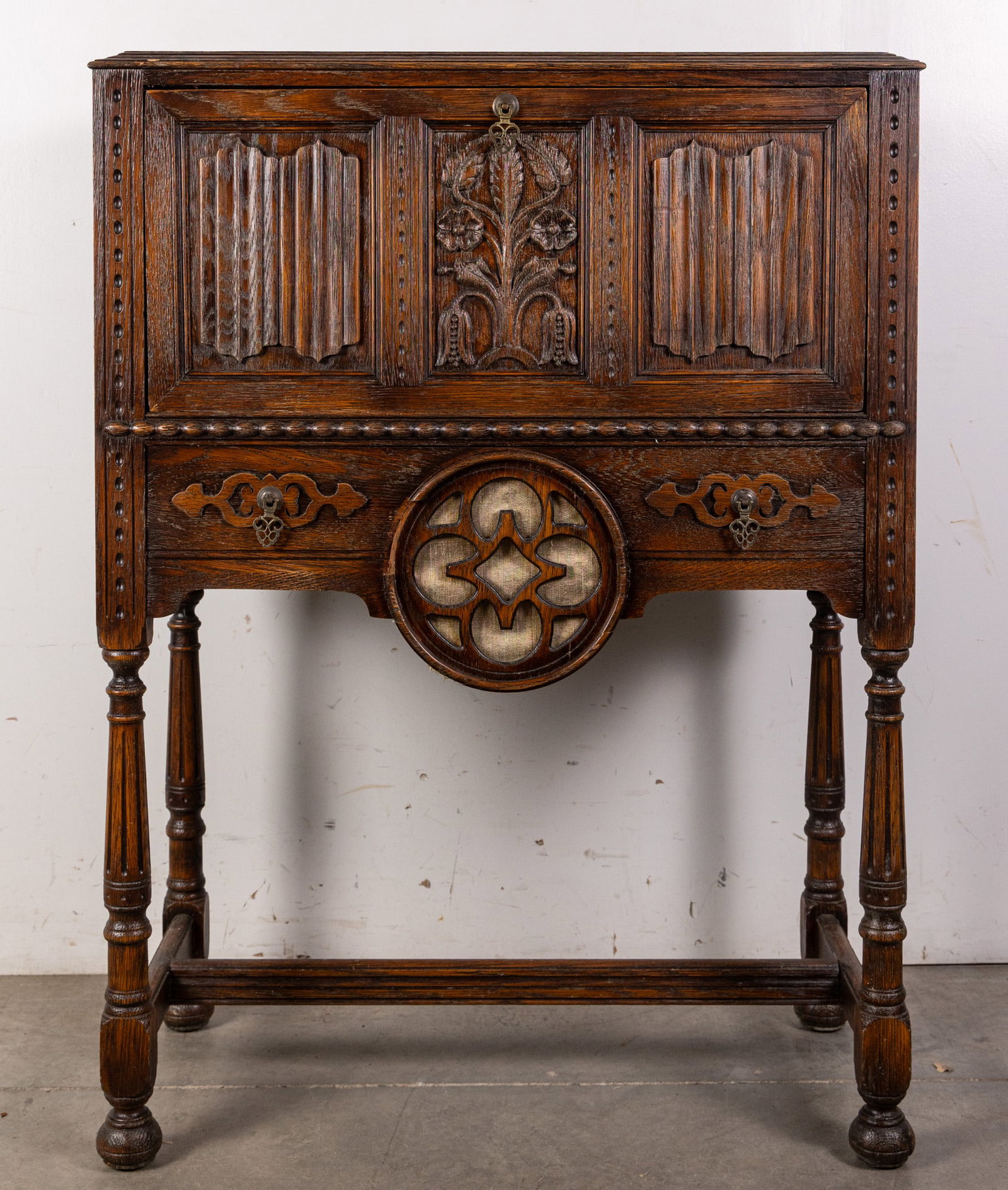 Vintage Wooden Jacobean-Style Bar Cabinet: Vintage Wooden Jacobean-Style Bar Cabinet Size 46" x 33" x 17" Literature Brooks Auction – Online Auction Terms & Conditions Contact: (856) 694-2960 | info@brooks.auction READ BEFORE YOU BID: