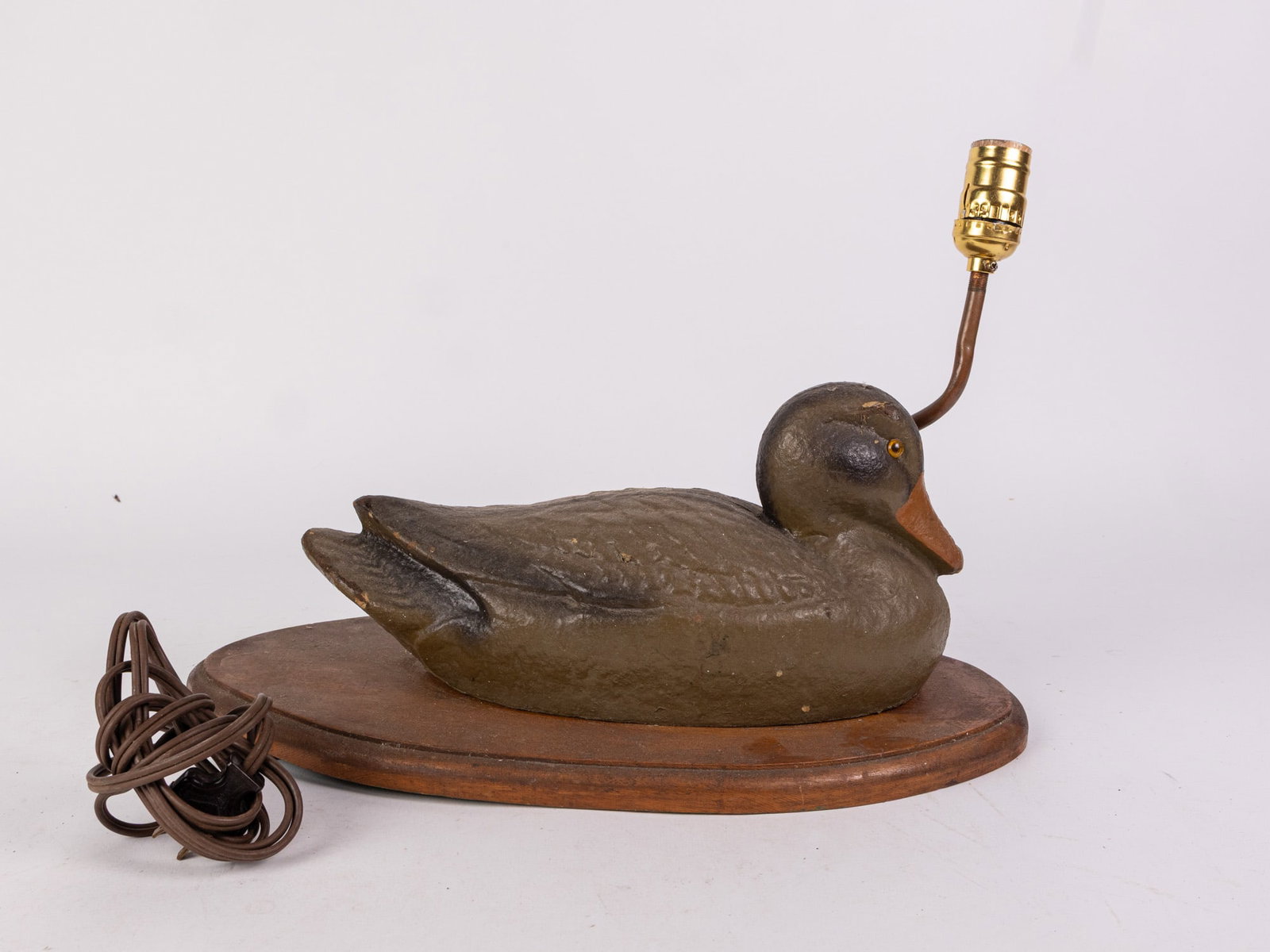 Vintage Molded Fiber Duck Decoy Figural Lamp: Vintage Molded Fiber Duck Decoy Figural Lamp Size 12" x 18" x 10" Literature Brooks Auction – Online Auction Terms & Conditions Contact: (856) 694-2960 | info@brooks.auction READ BEFORE YOU