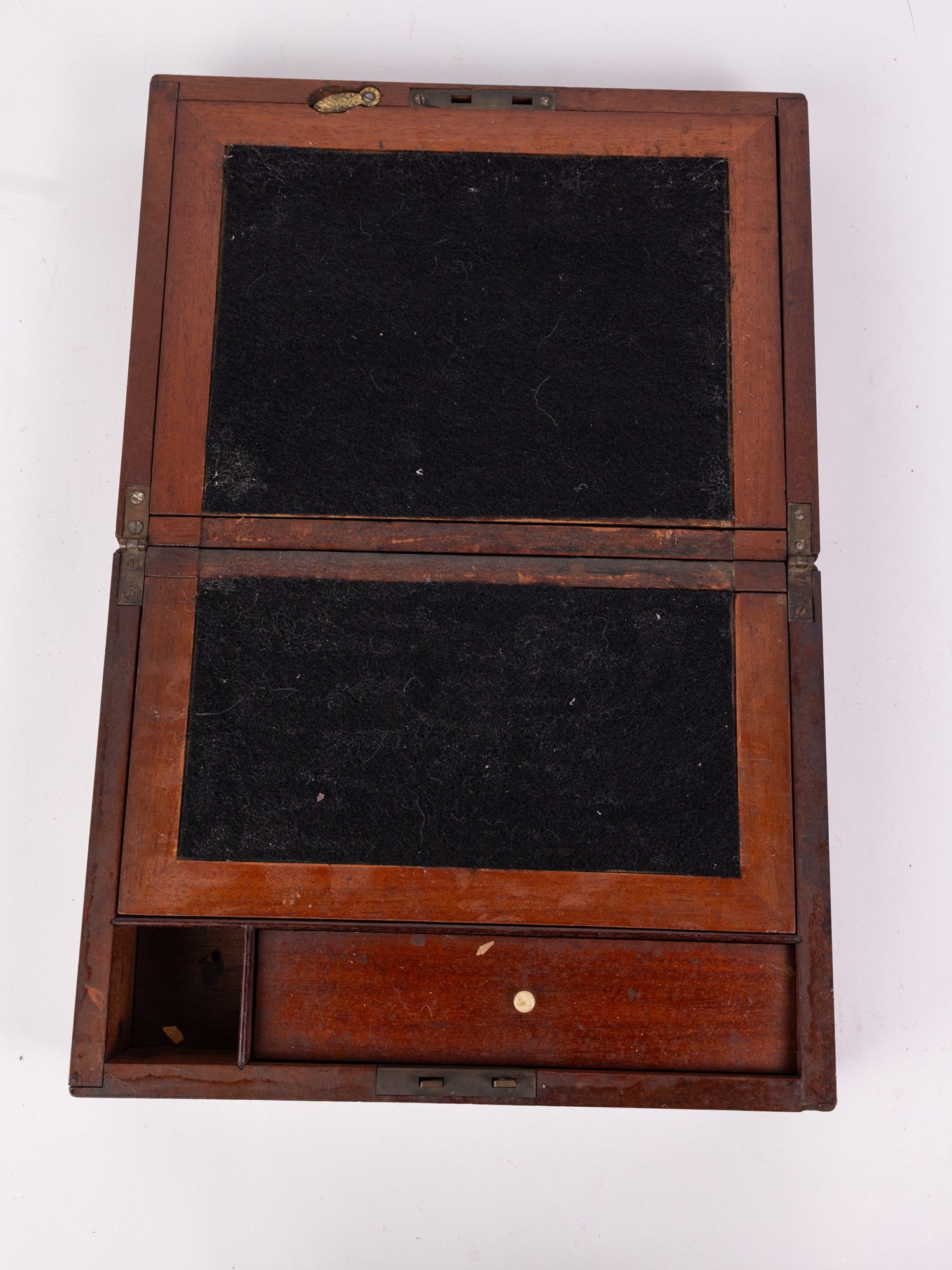 Antique Wooden Portable Writing Desk: Portable writing desk in the form of a trinket box. Missing escutcheon. Size 4" x 10" x 7.5" Literature Brooks Auction – Online Auction Terms & Conditions Contact: (856) 694-2960 |