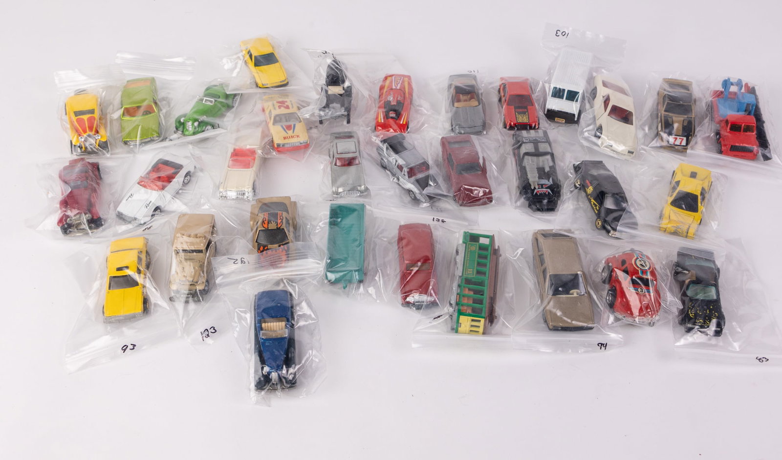 Assorted Vintage Die Cast Miniature Toy Cars Featuring Hotwheels: Assorted Vintage Die Cast Miniature Toy Cars Featuring Hotwheels Size 7" x 12" x 12" Literature Brooks Auction – Online Auction Terms & Conditions Contact: (856) 694-2960 | info@brooks.auction