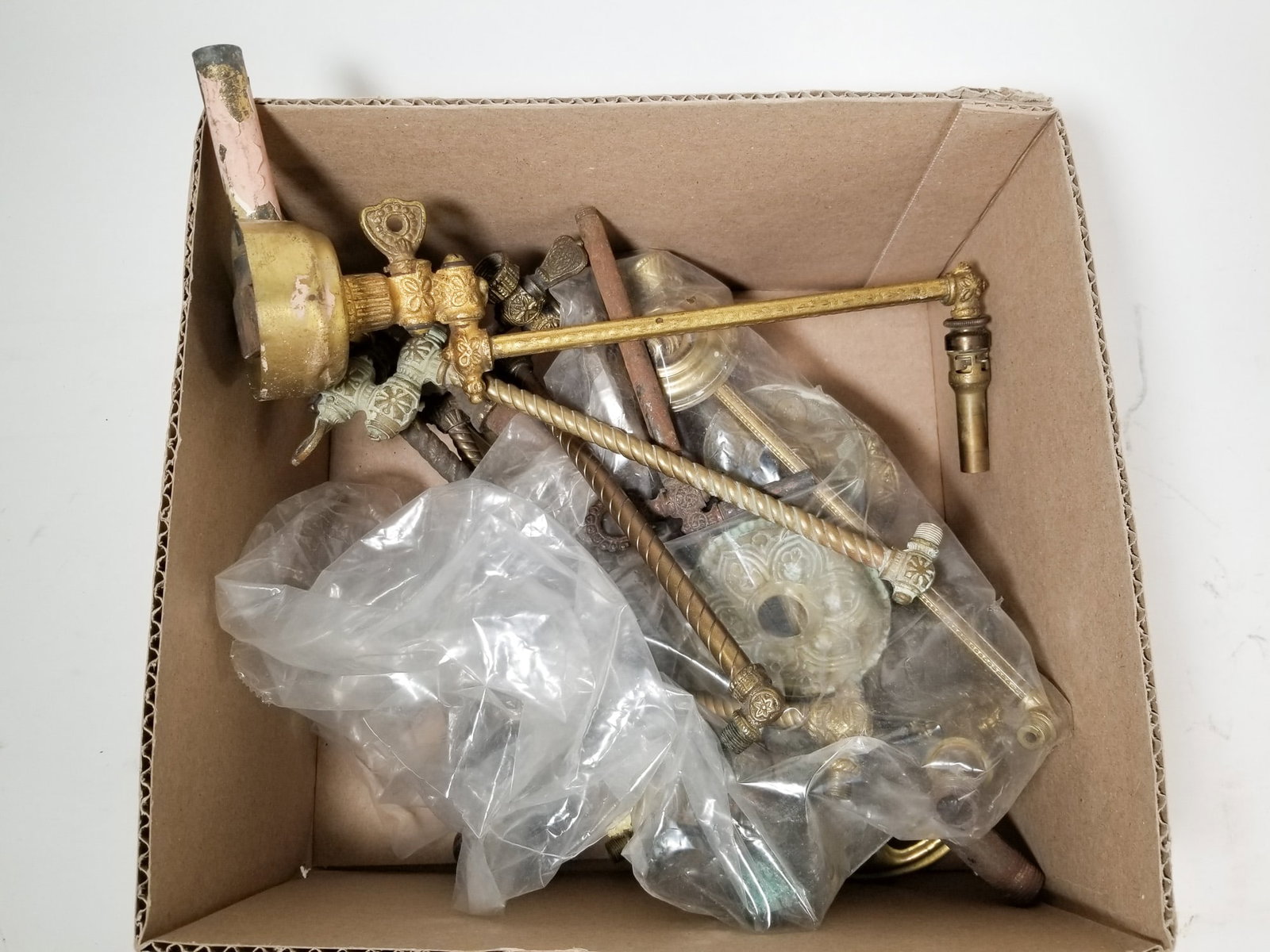 Assortment of Antique Brass Sconces & Hardware: Assortment of Antique Brass Sconces & Hardware Size 7" x 12" x 12" Literature Brooks Auction – Online Auction Terms & Conditions Contact: (856) 694-2960 | info@brooks.auction READ BEFORE YOU