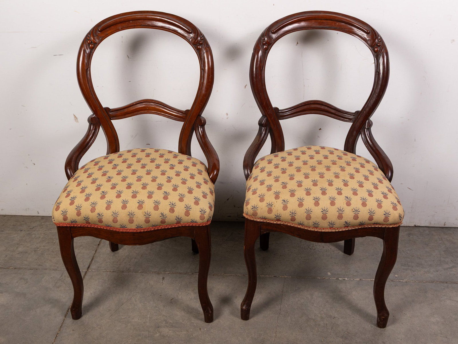 Pair of Wood Carved Upholstered Side Chairs: Pair of Wood Carved Upholstered Side Chairs Size 35" x 19" x 20" Literature Brooks Auction – Online Auction Terms & Conditions Contact: (856) 694-2960 | info@brooks.auction READ BEFORE YOU BID: