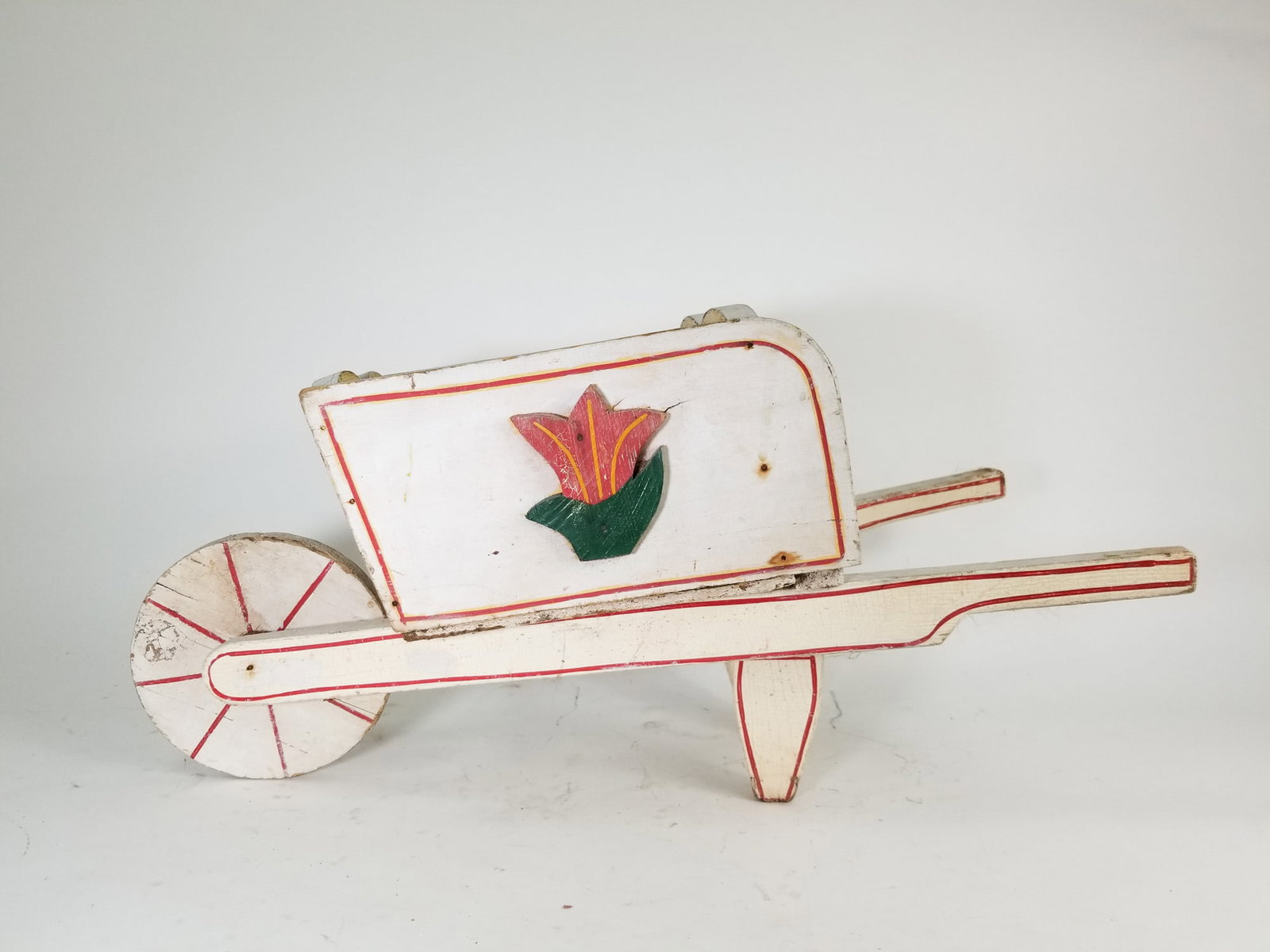 Vintage Decorative Wooden Painted Whimsical Wheelbarrow: Vintage Decorative Wooden Painted Whimsical Wheelbarrow Size 14" x 27" Literature Brooks Auction – Online Auction Terms & Conditions Contact: (856) 694-2960 | info@brooks.auction READ BEFORE