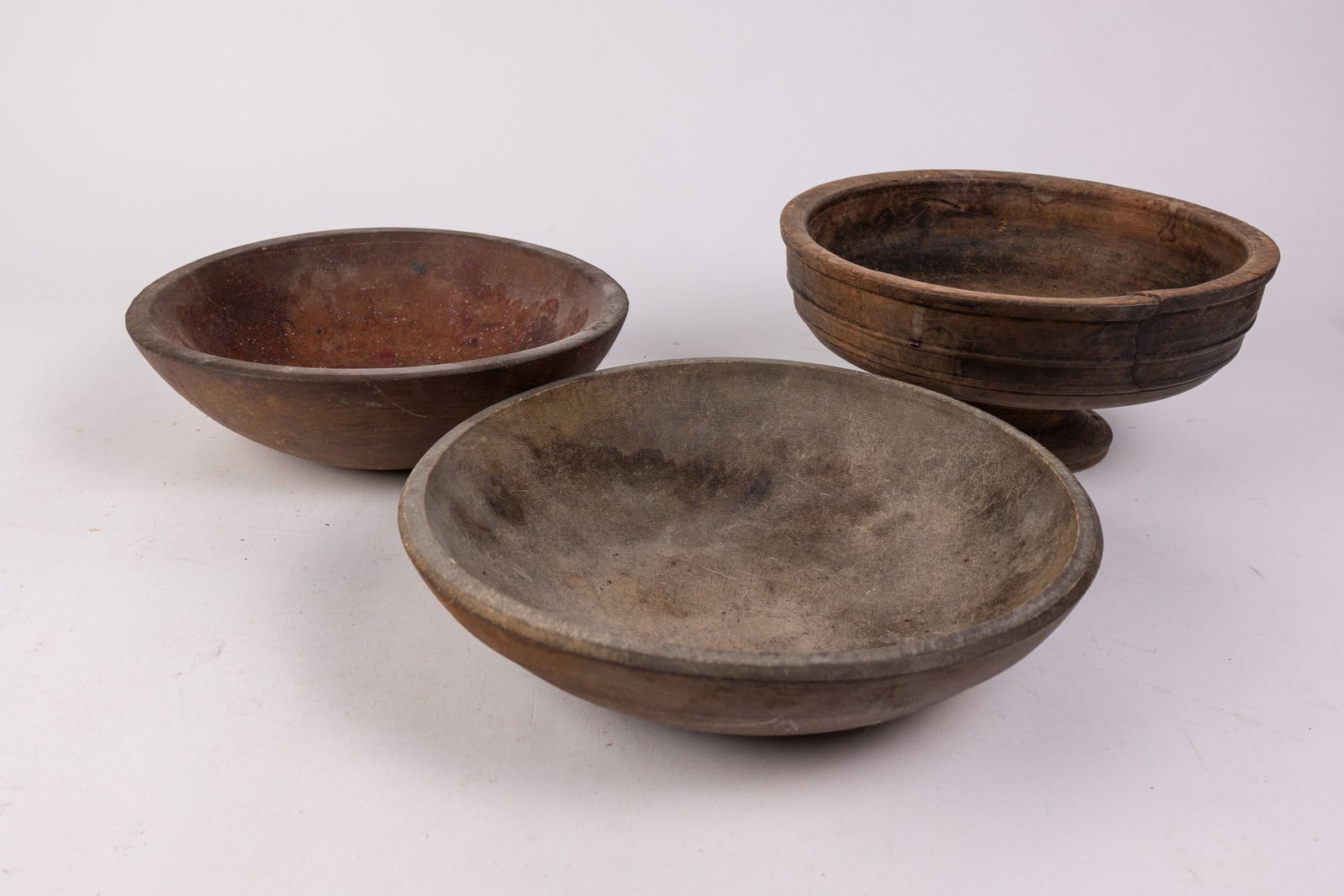 Assorted Primitive Wooden Vessels: Assorted Primitive Wooden Vessels Size 3" x 12" diameter Literature Brooks Auction – Online Auction Terms & Conditions Contact: (856) 694-2960 | info@brooks.auction READ BEFORE YOU BID: We want