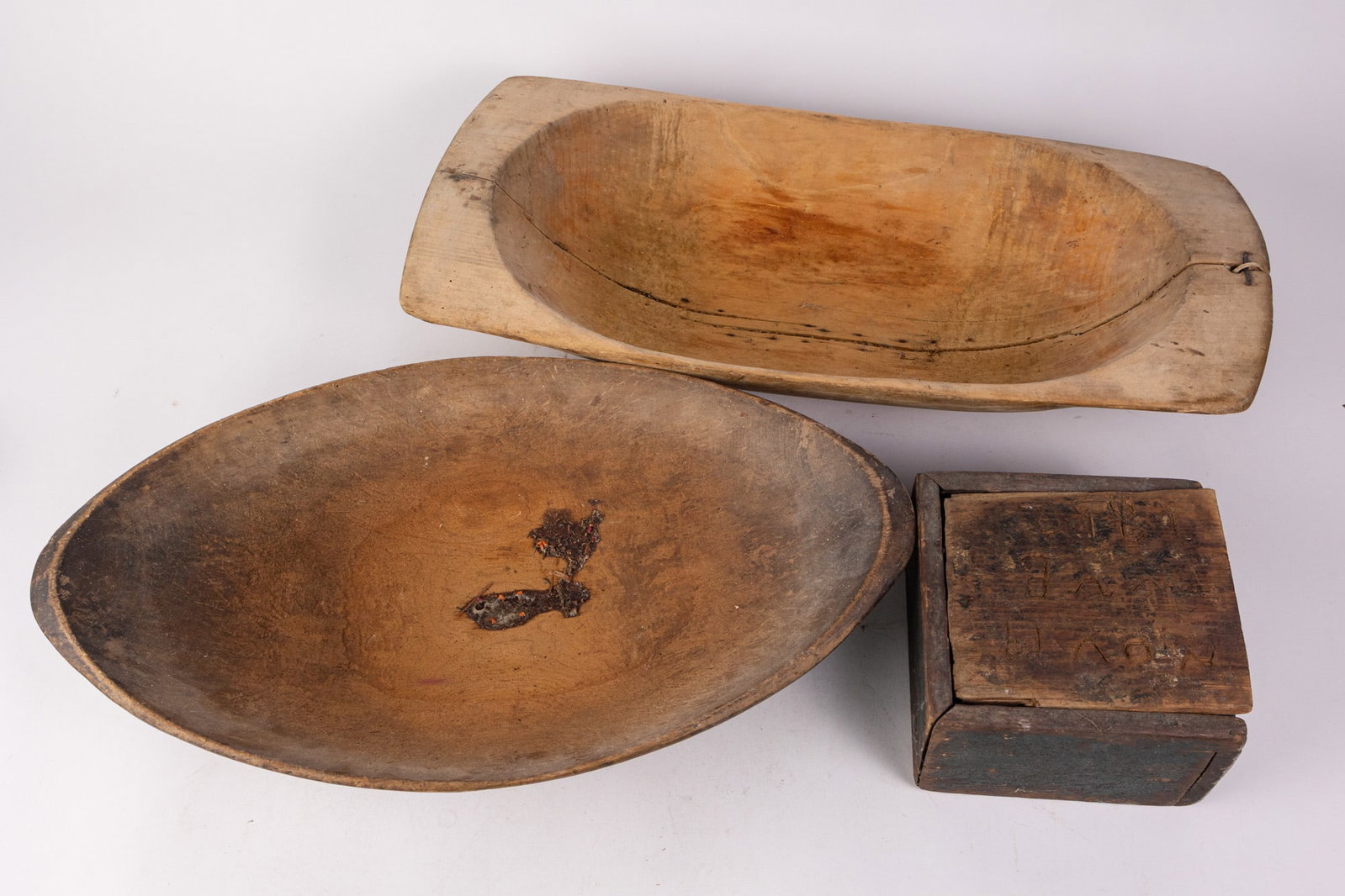 Assorted Primitive Wooden Vessels: Assorted Primitive Wooden Vessels Size 4" x 22" x 10" Literature Brooks Auction – Online Auction Terms & Conditions Contact: (856) 694-2960 | info@brooks.auction READ BEFORE YOU BID: We want