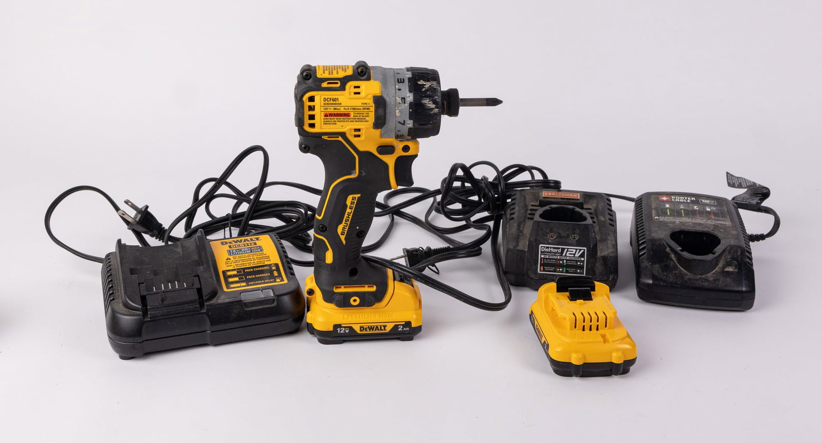 DeWalt Brushless Screwdriver with Two 12V Lithium Batteries and Assorted Chargers: DeWalt Brushless Screwdriver with Two 12V Lithium Batteries and Assorted Chargers Size 7" x 12" x 12 Literature Brooks Auction – Online Auction Terms & Conditions Contact: (856) 694-2960 |