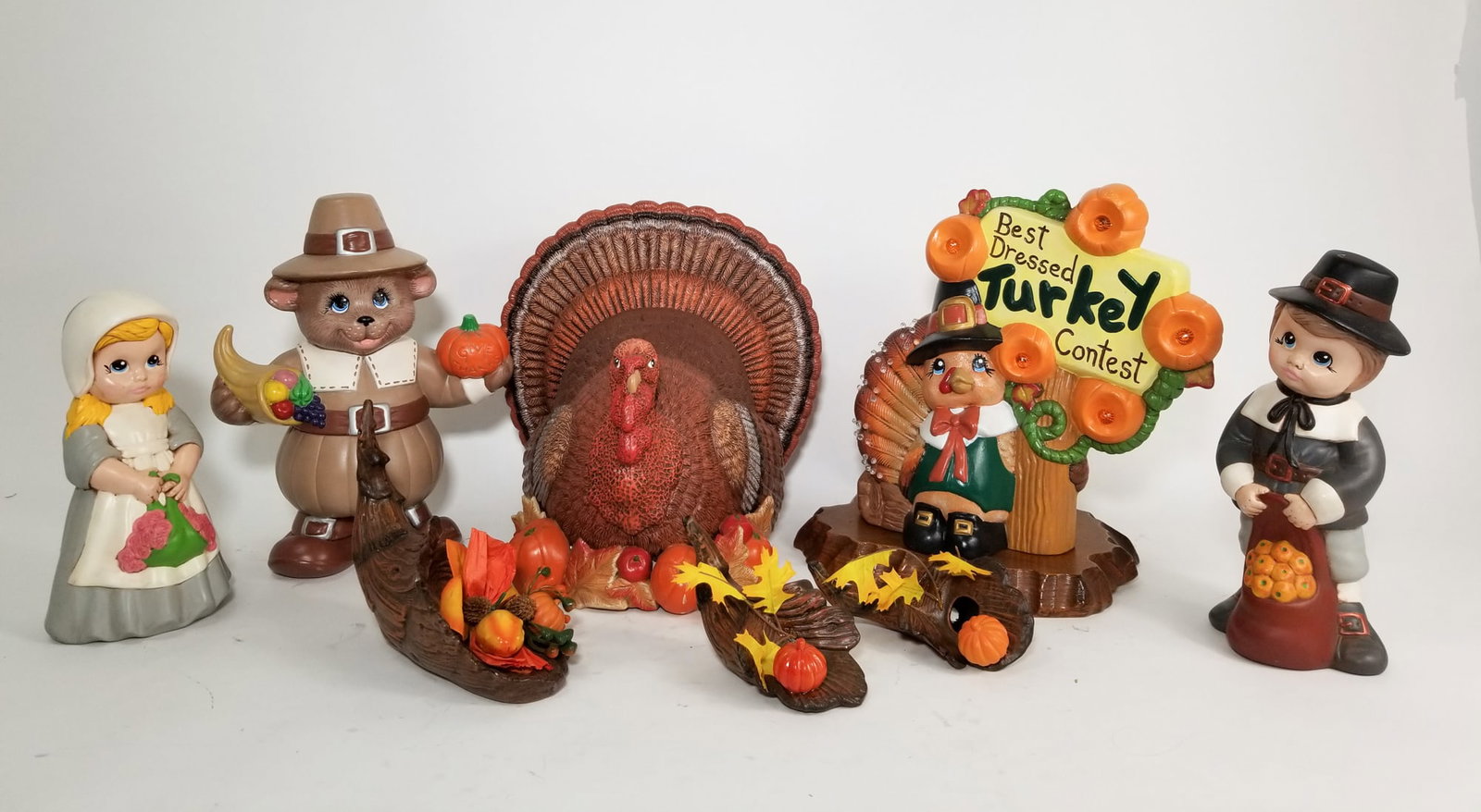 Assorted Ceramic Thanksgiving Decor: Assorted Ceramic Thanksgiving Decor Size 11" H Literature Brooks Auction – Online Auction Terms & Conditions Contact: (856) 694-2960 | info@brooks.auction READ BEFORE YOU BID: We want you to