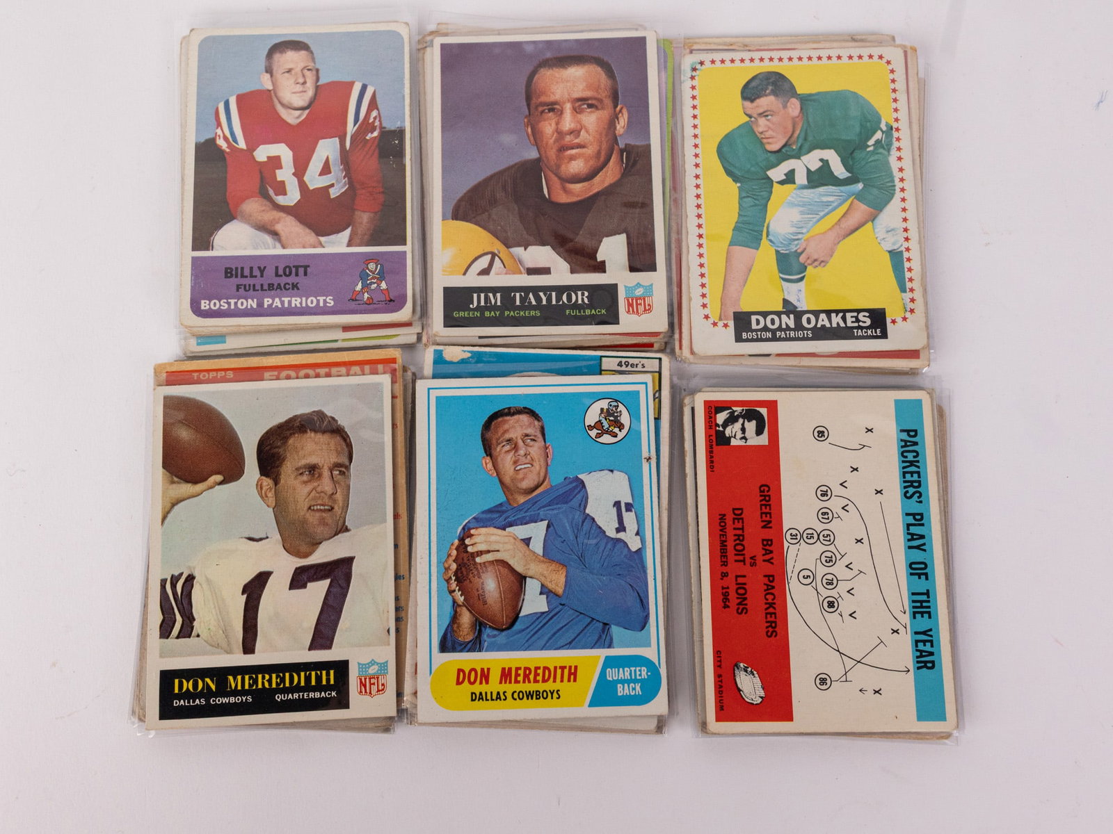 40 Pre 1970 NFL Trading Card Assortment: 40 Pre 1970 NFL Trading Card Assortment Size 7" x 12" x 12" Literature Brooks Auction – Online Auction Terms & Conditions Contact: (856) 694-2960 | info@brooks.auction READ BEFORE YOU BID:</