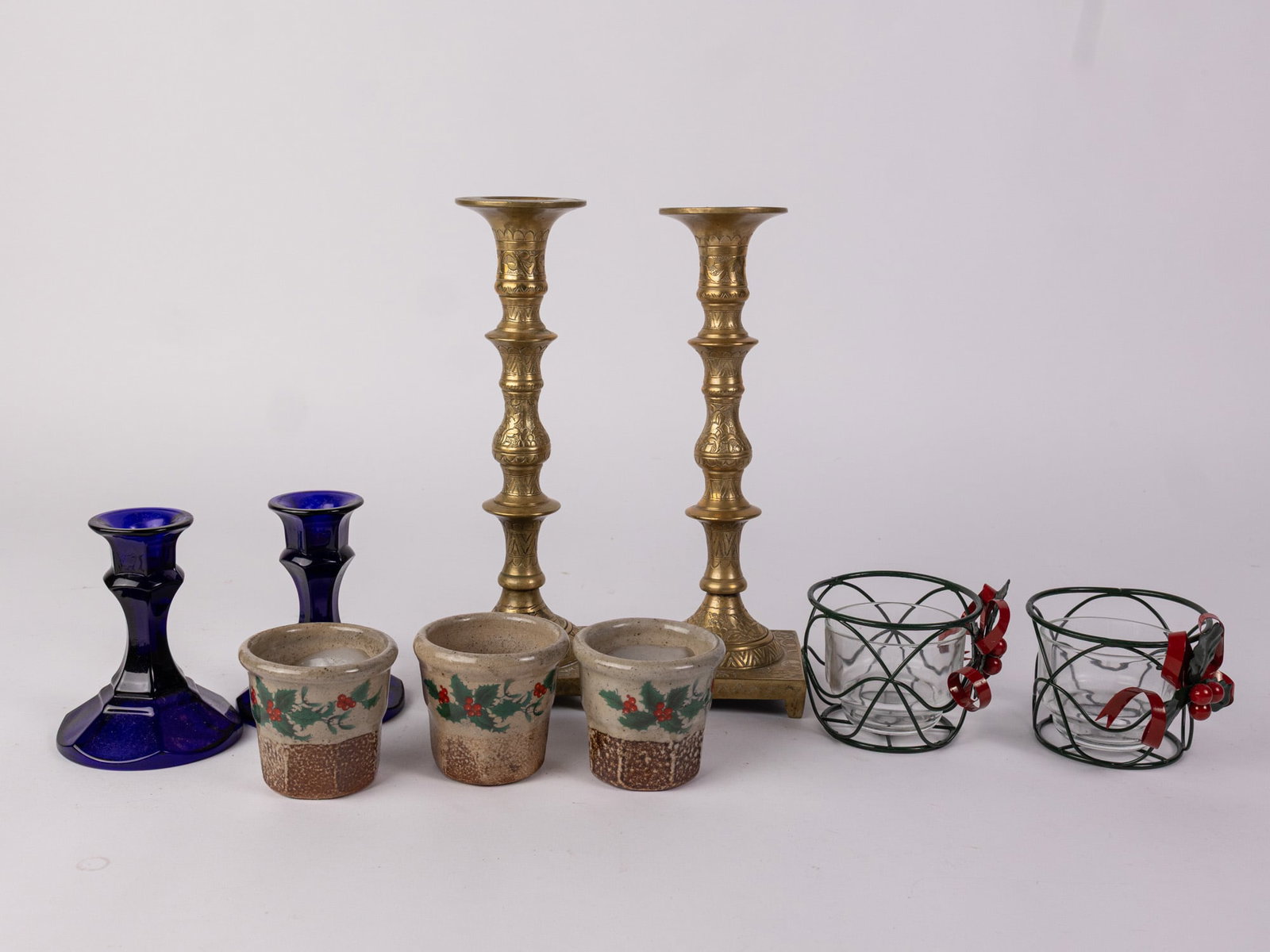 Assortment of Candle Holders: Assortment of Candle Holders Size 7' x 12" x 12" Literature Brooks Auction – Online Auction Terms & Conditions Contact: (856) 694-2960 | info@brooks.auction READ BEFORE YOU BID: We want you to